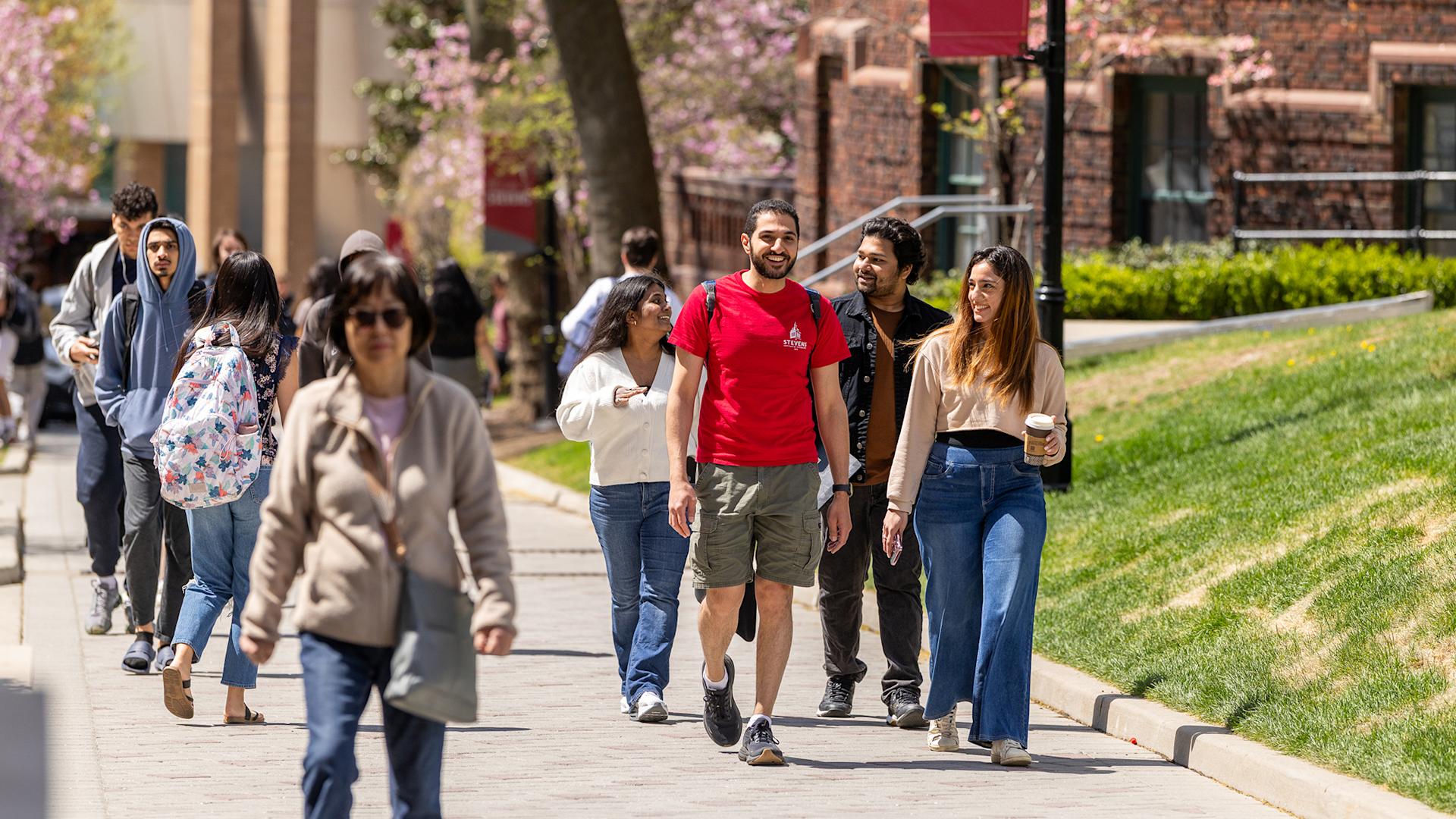 Students walking down Whitpenn Stevens