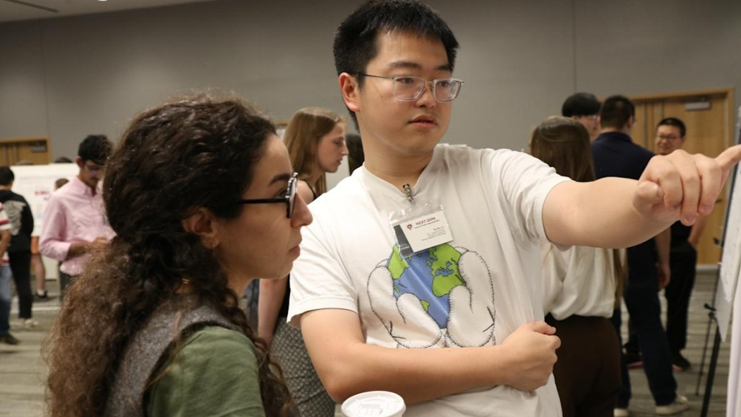 Students connecting over research.