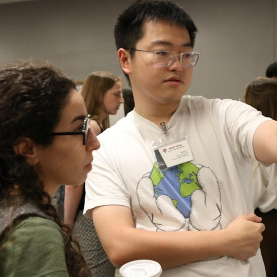 Students connecting over research.