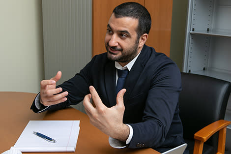 Majeed Simaan teaching at a desk