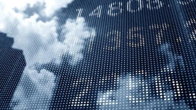 Stock image of financial numbers on a building