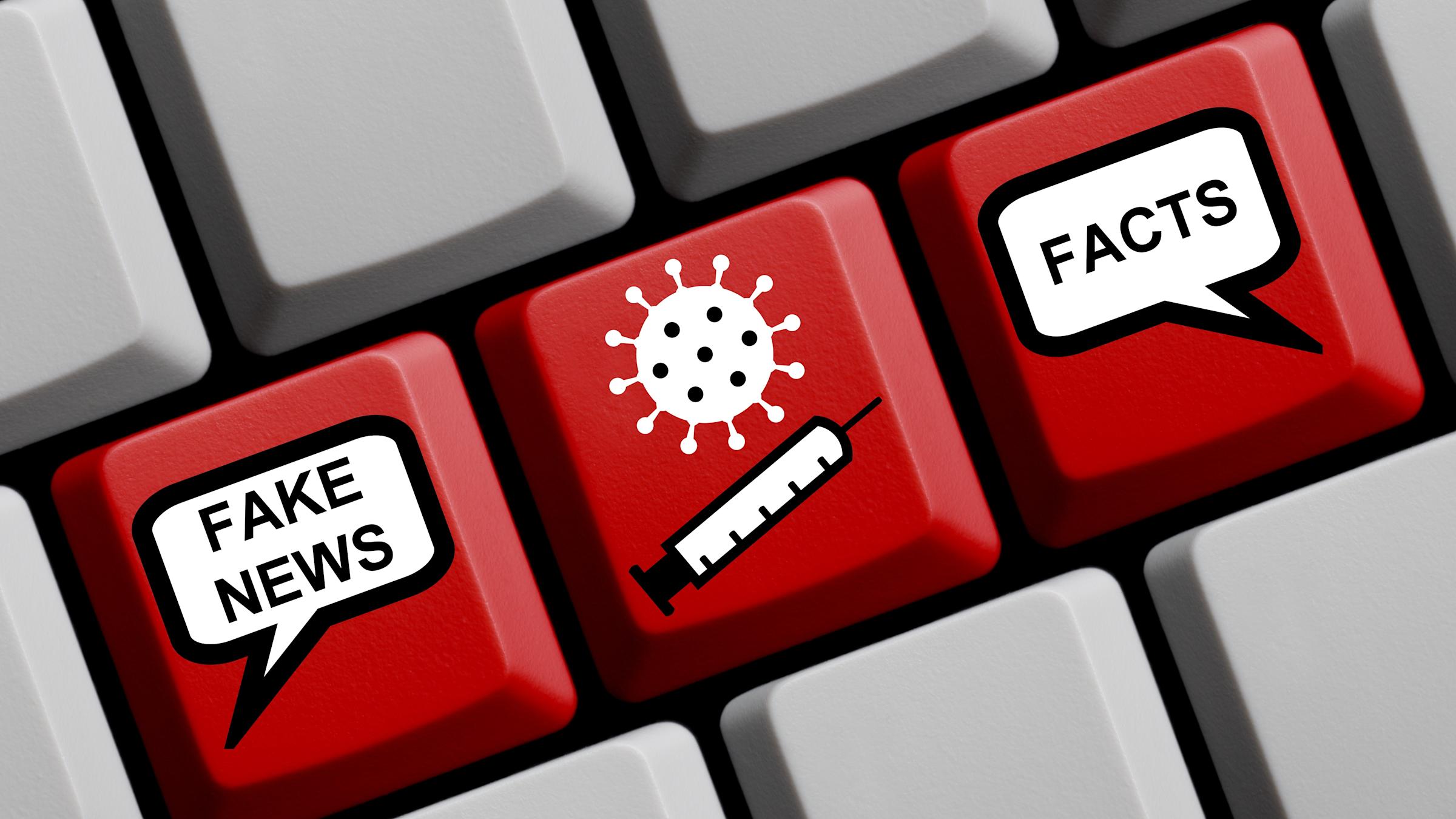 Computer keys spelling the words fake news and facts