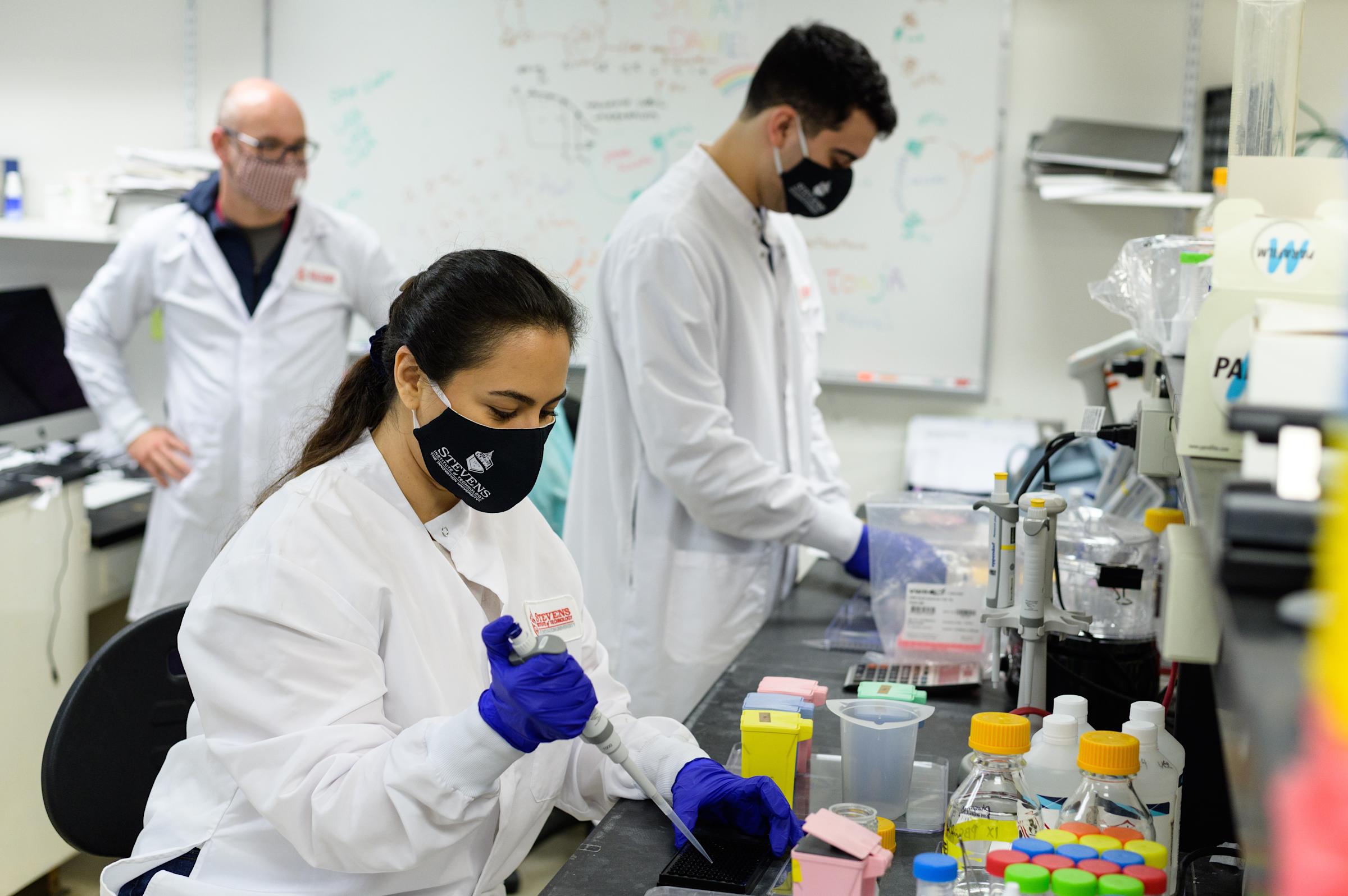 photo of Stevens researchers in a lab