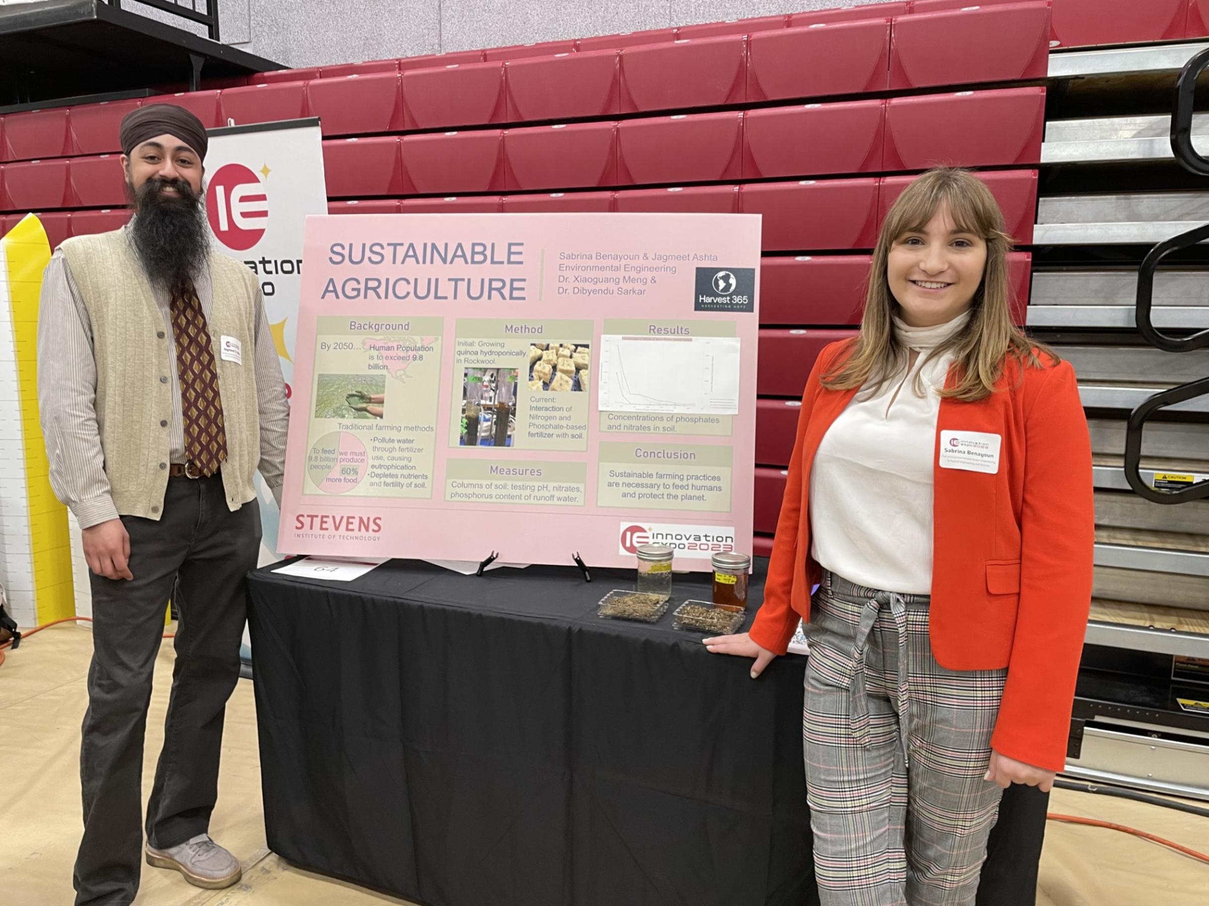Jagmeet Ashta ’23 and Sabrina Benayoun ’23 pose with their research poster at the 2023 Innovation Expo