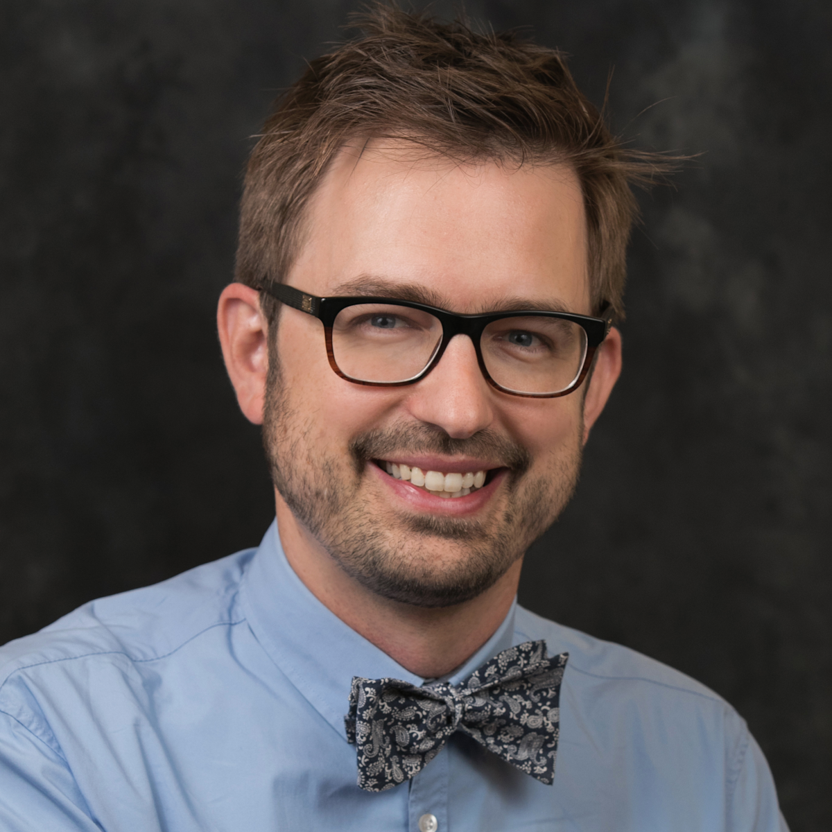 Professional headshot/portrait of Eric Koskinen