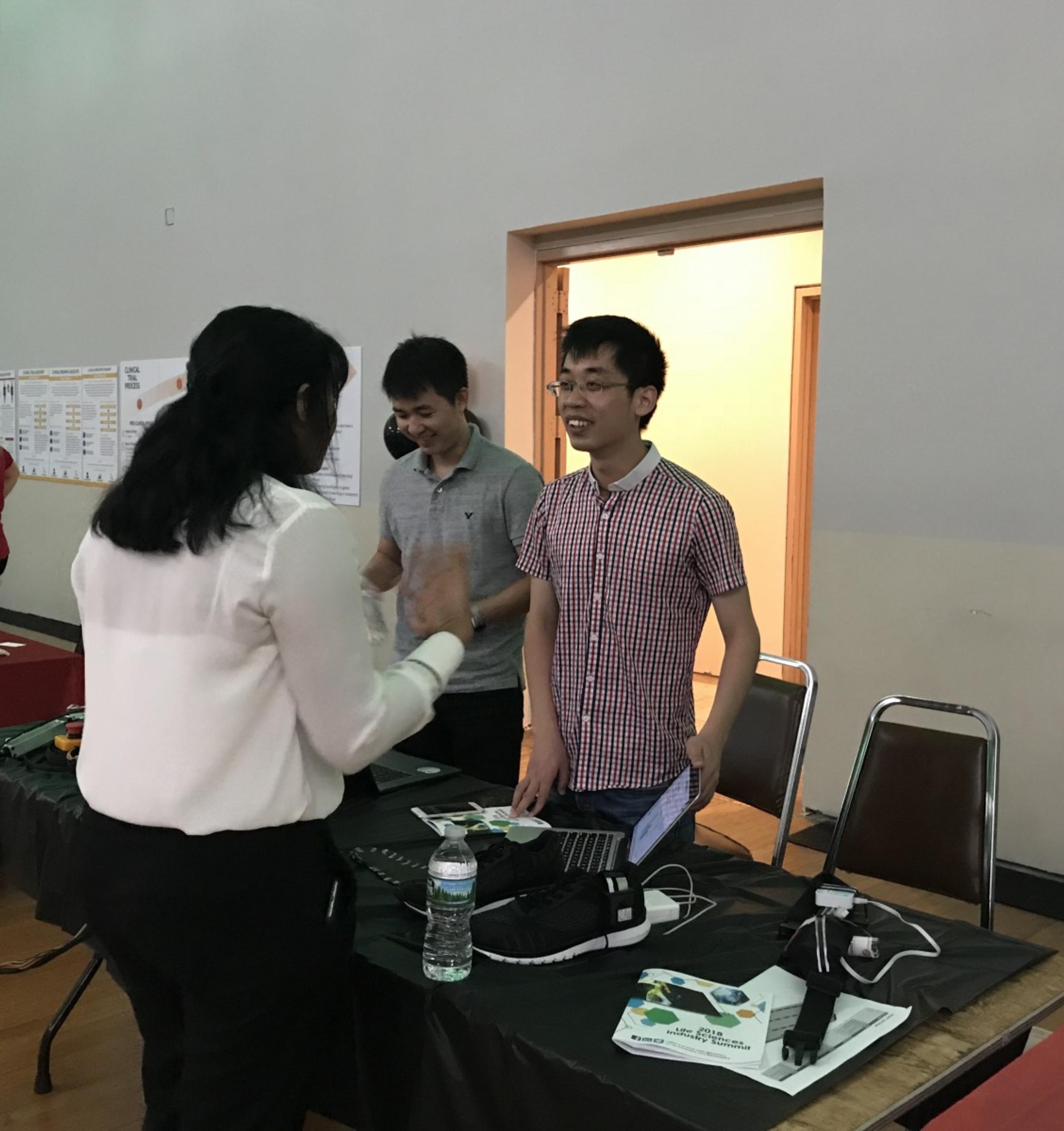 Yufeng Zhang and Huanghe Zhang presenting at the summit. CREDIT: Shreya Parekh