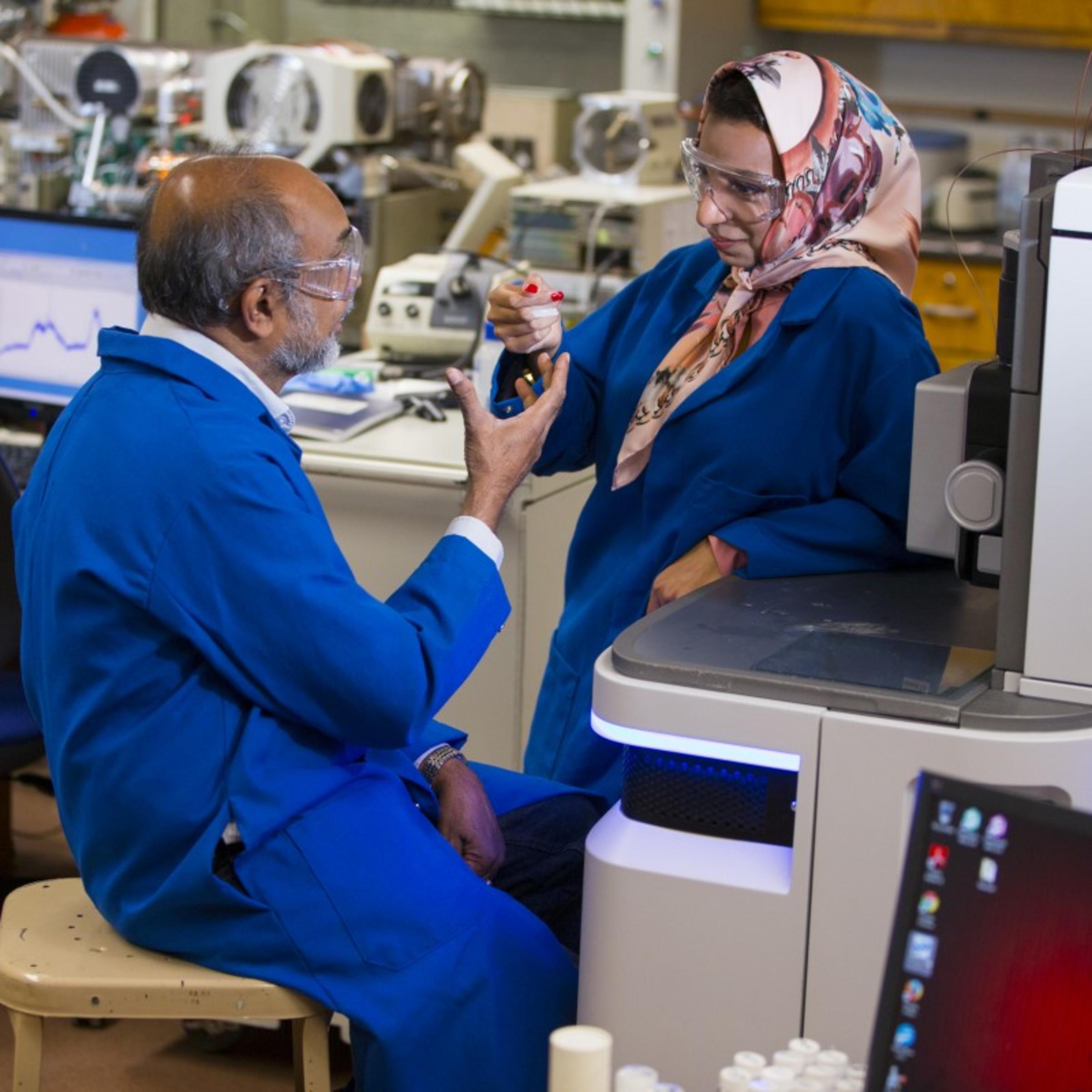 Athula Attygalle instructing a student in the Mass Spectrometry Laboratory