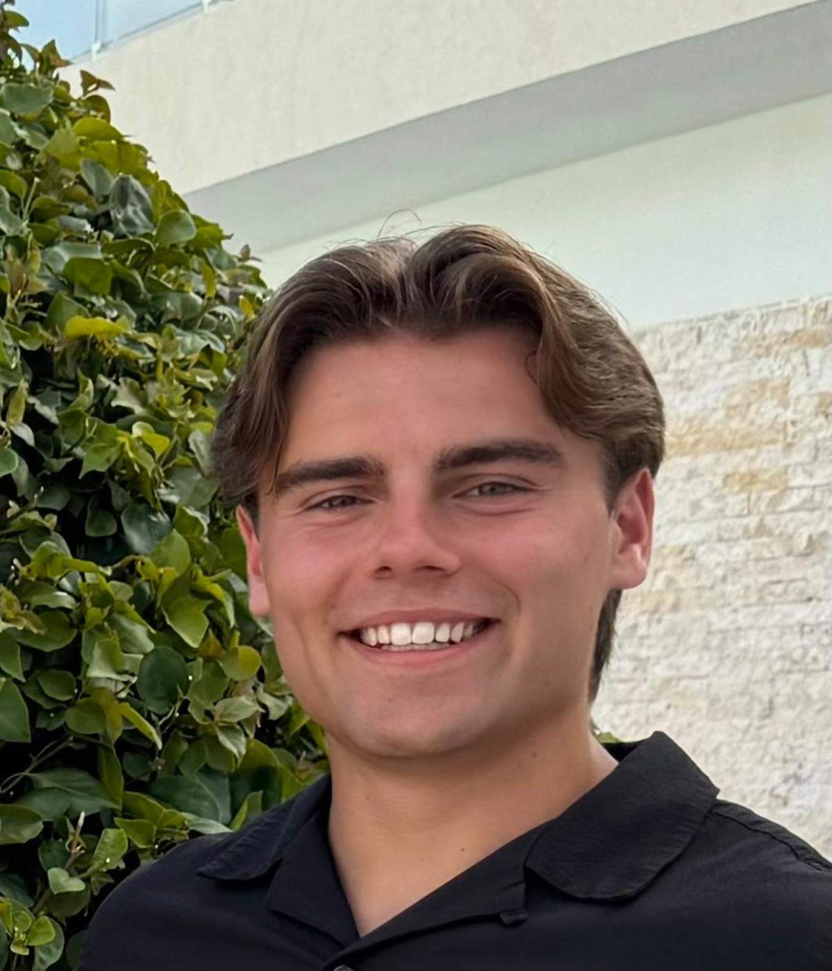 A headshot of a man