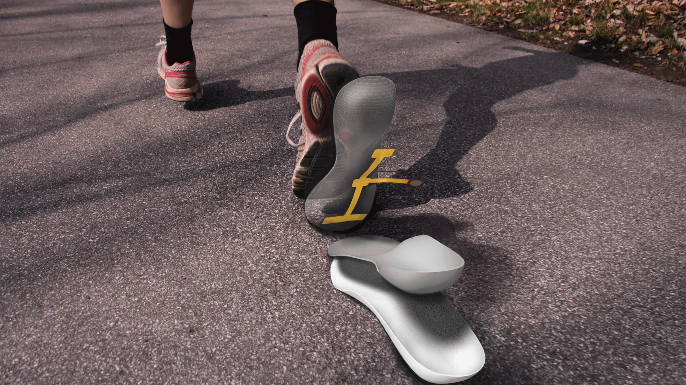 An image of a sneaker on a foot. Underneath the sneaker is an idealized image of two insoles.