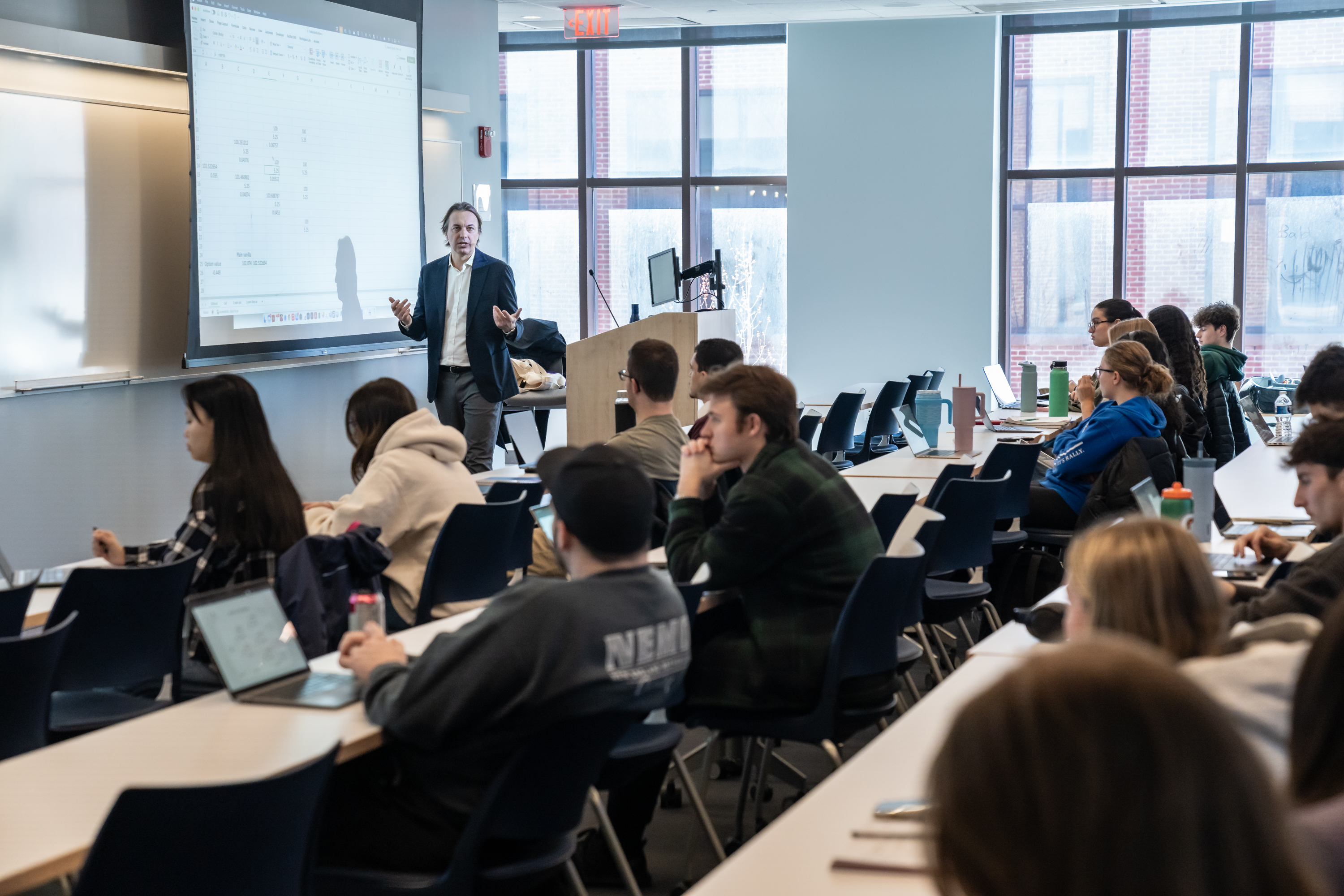 Professor Bonini teaching in classroom