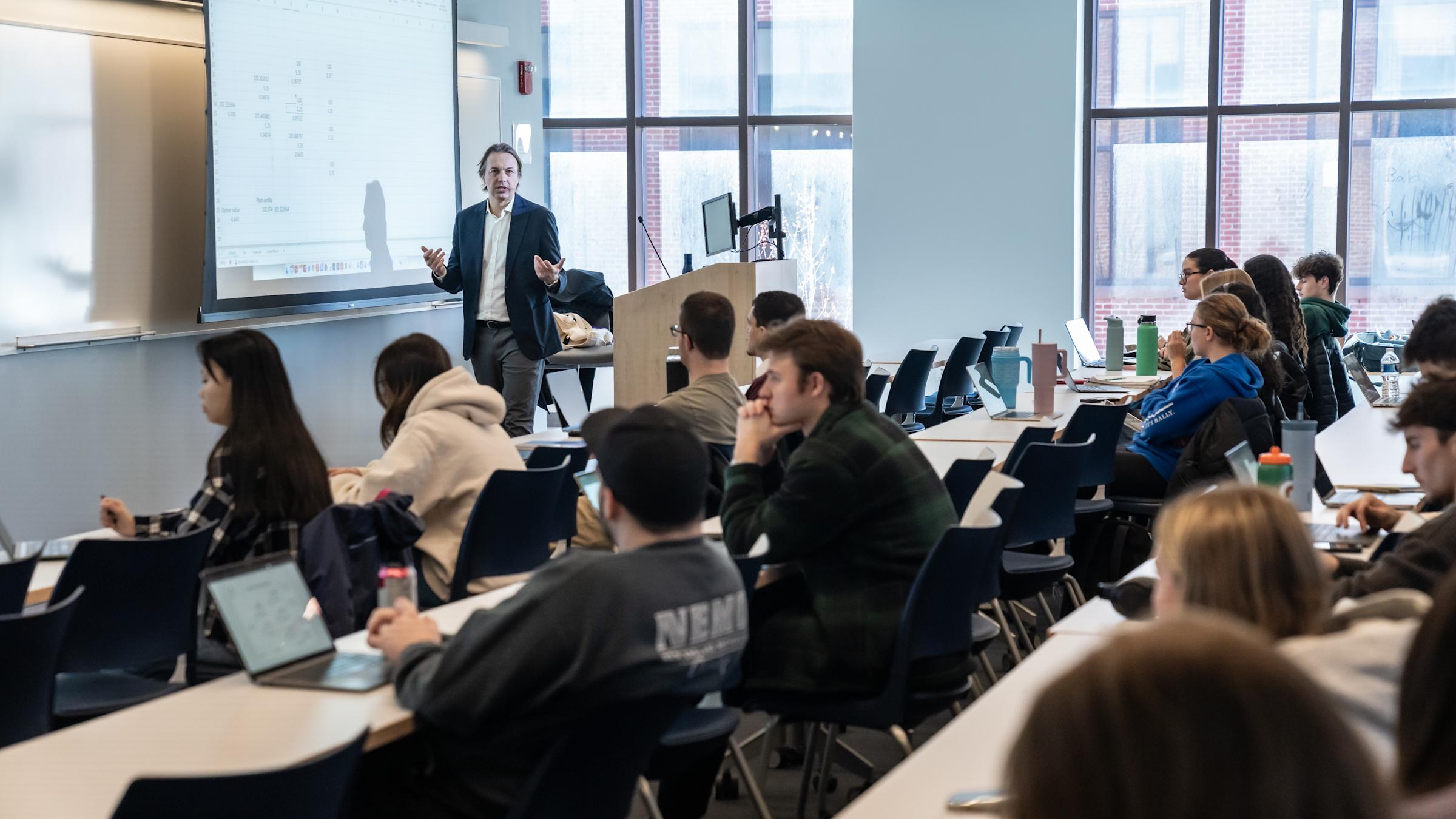 Professor Bonini teaching in classroom