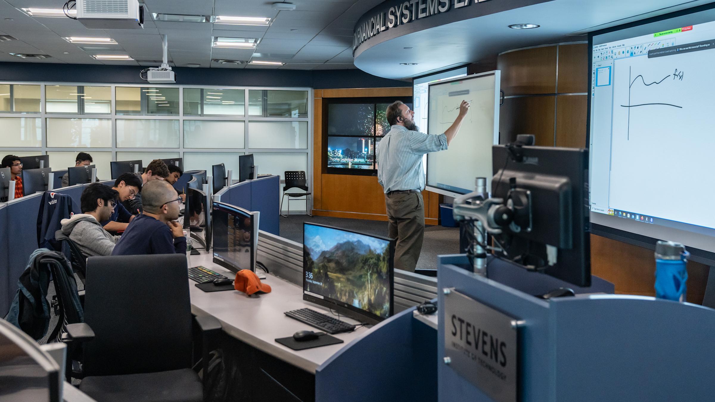 Professor teaching in Hanlon Lab