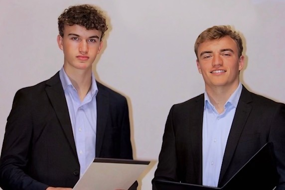 Aron Dyaduk and his brother stand next to each other.