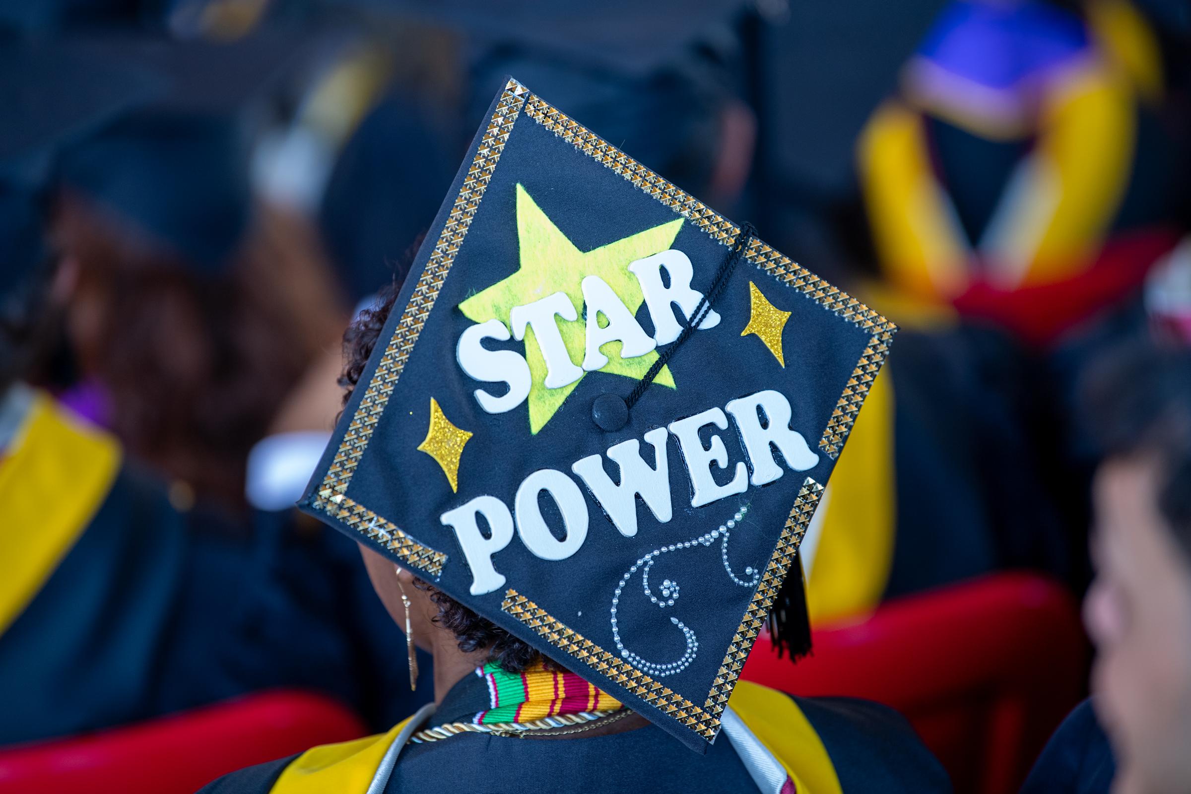A graduation cap decorated with the words "Star Power"