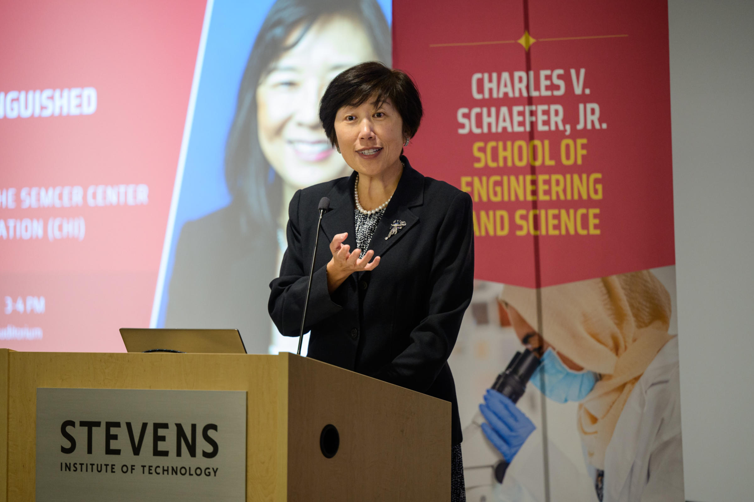 Jean Zu, dean of the Schaefer School of Engineering and Science, speaks at a podium