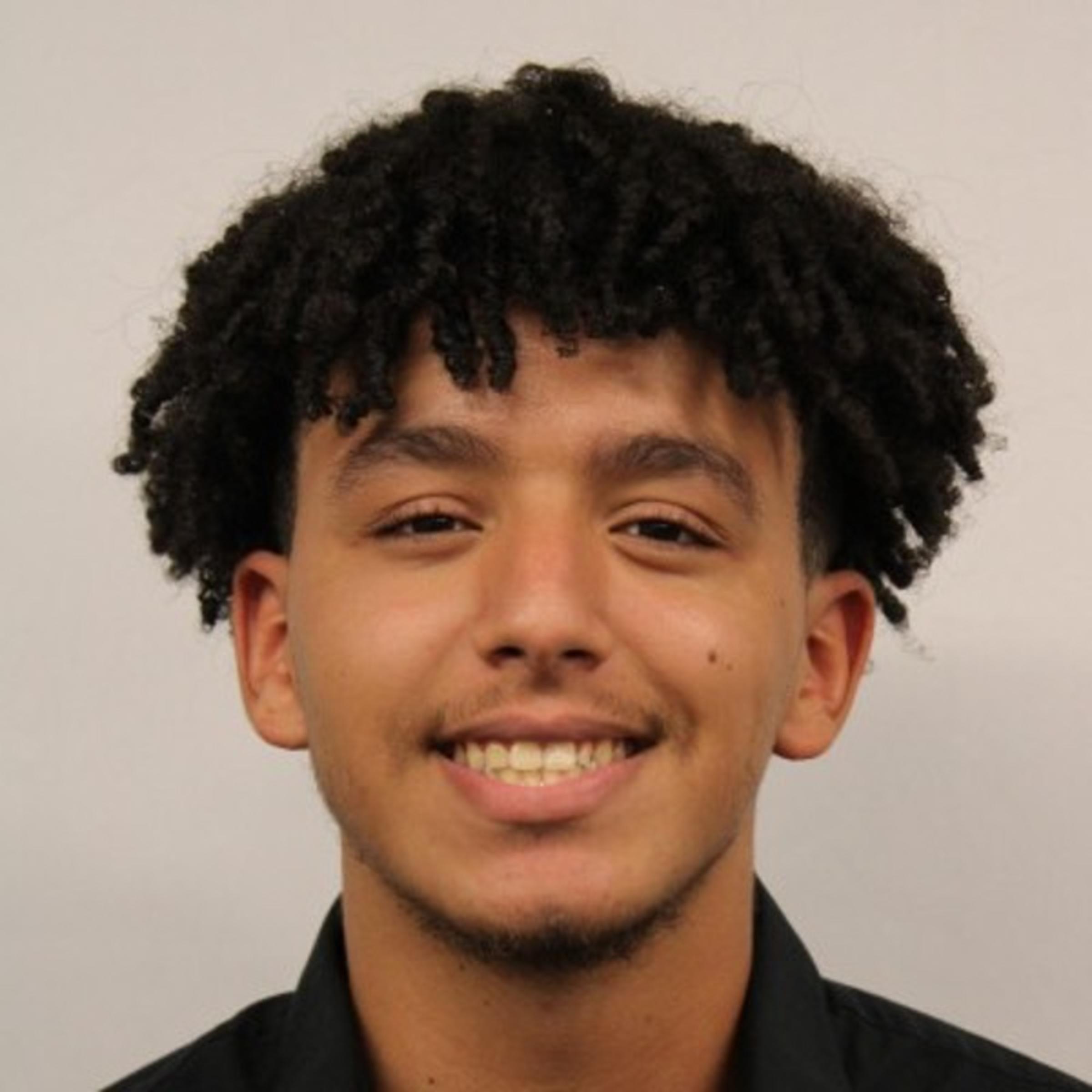 Headshot of Hicham Abarkha