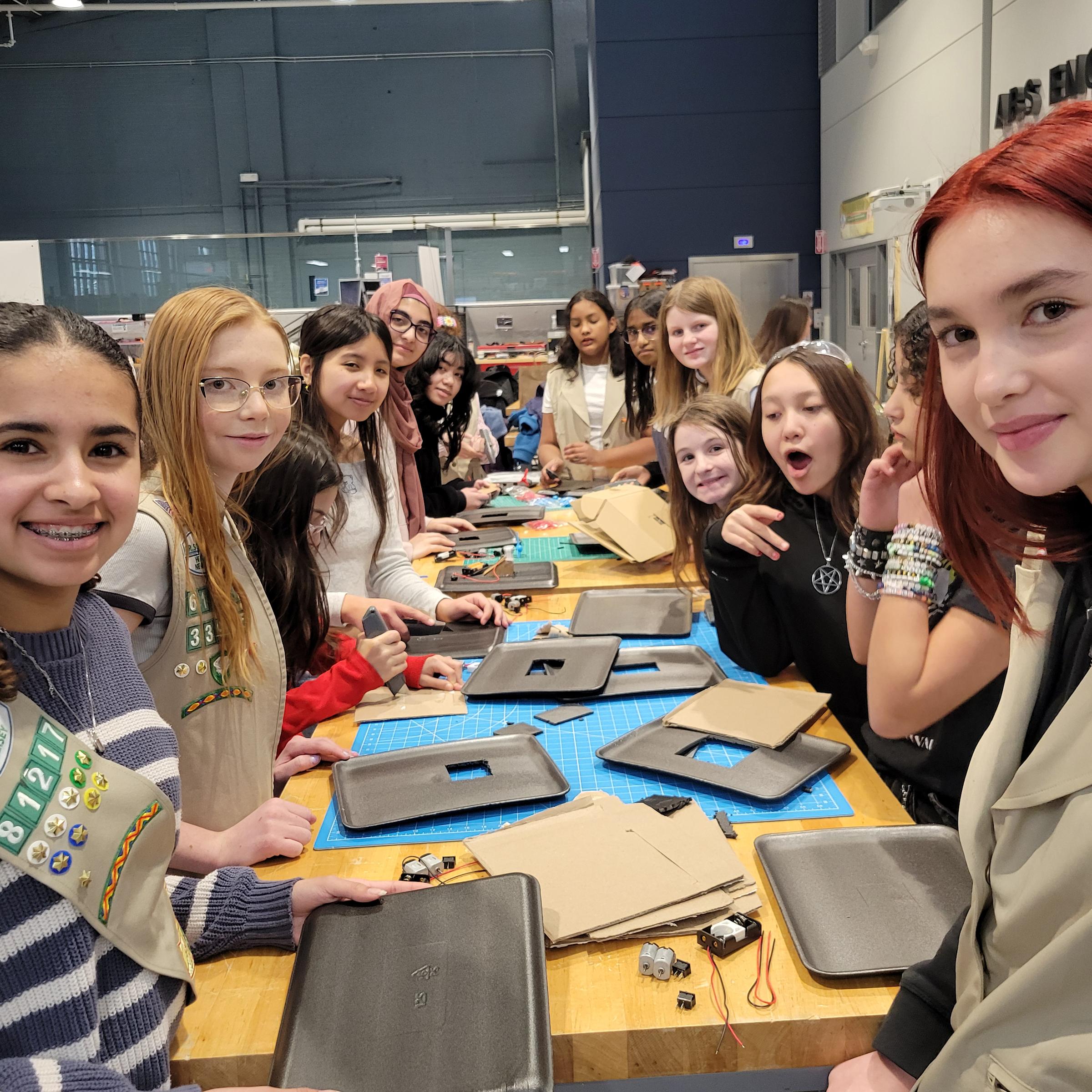 Several Girl Scouts participate in the workshop of the Stevens MakerSpace.