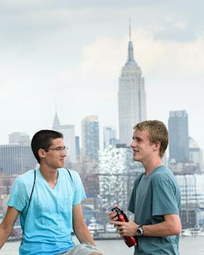 Students standing in front of the Empire State Building
