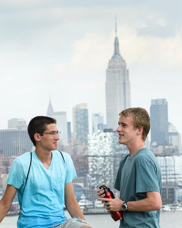 Students standing in front of the Empire State Building