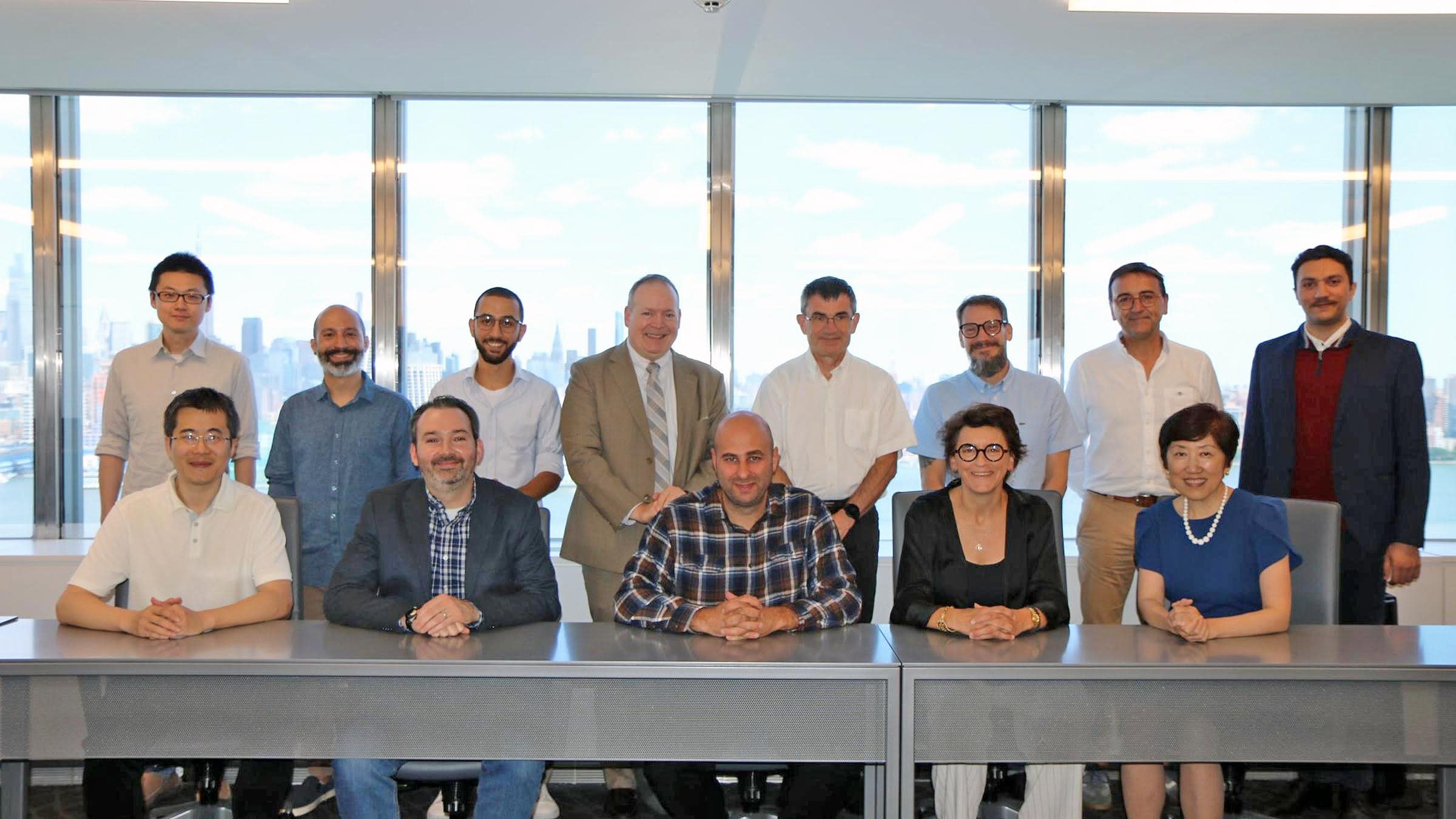 The Ecole Centrale de Nantes delegation poses for a photo with Schaefer School leadership and Dean Jean Zu.