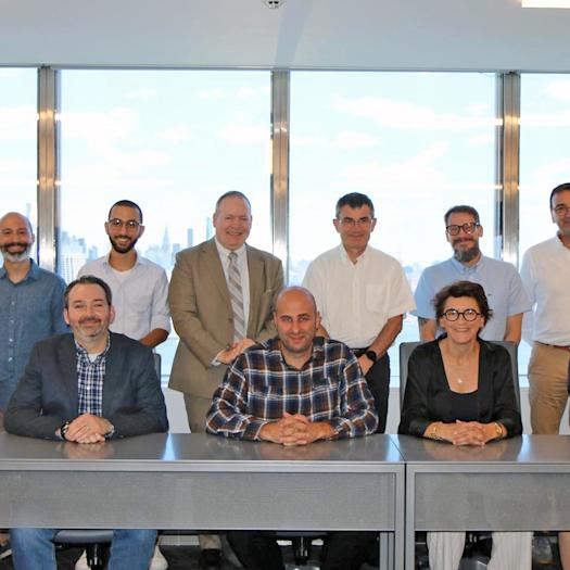 The Ecole Centrale de Nantes delegation poses for a photo with Schaefer School leadership and Dean Jean Zu.