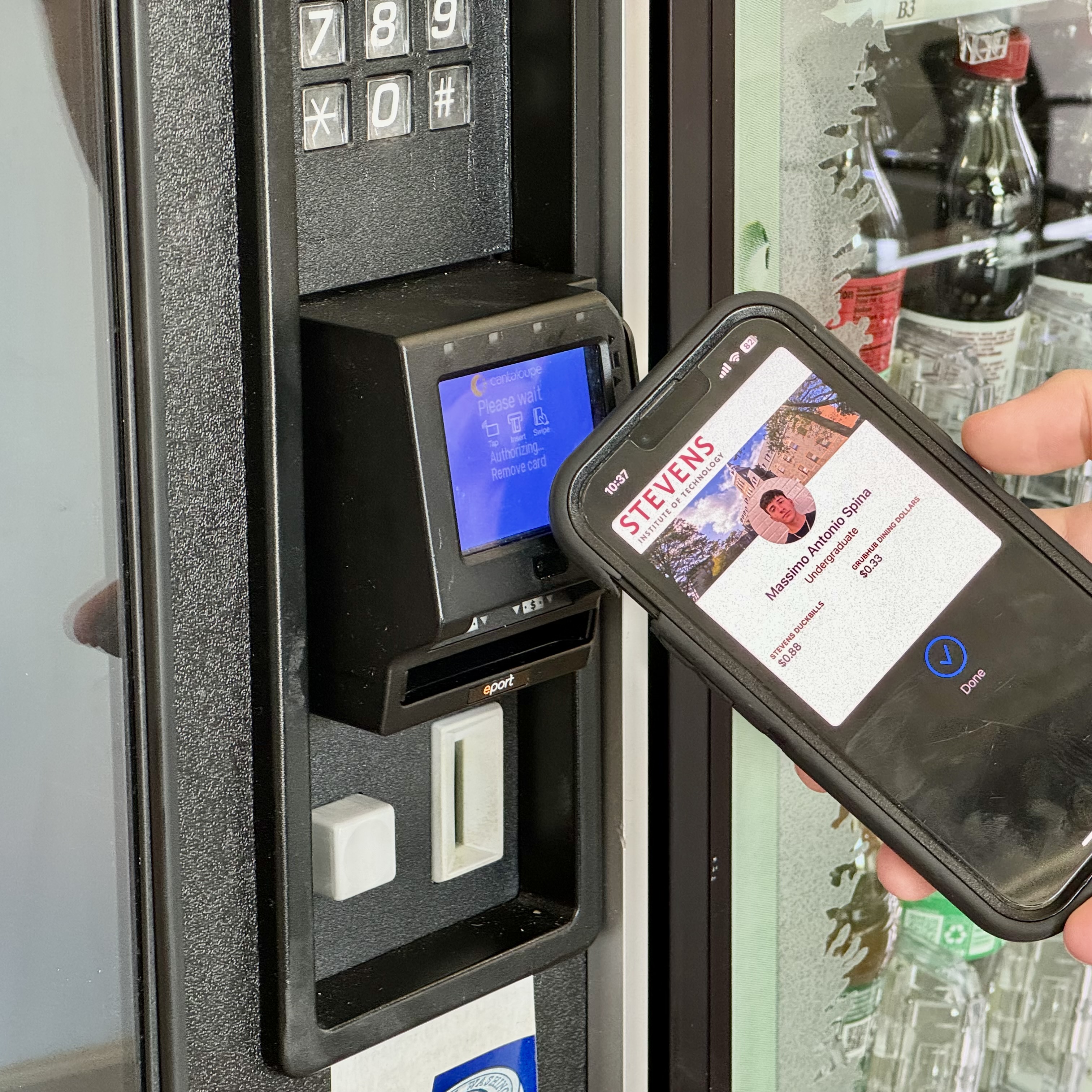 Person scanning their DuckCard in Apple Watch at Dining