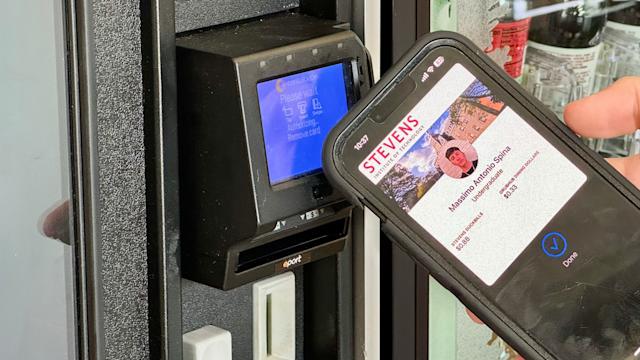 Person scanning their DuckCard in Apple Watch at Dining