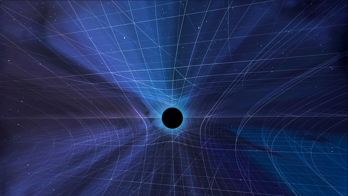 Against a background of stars, a black sun or planet glows blue, surrounded by geometric and curved lines radiating from it at the center, representing the force of gravity