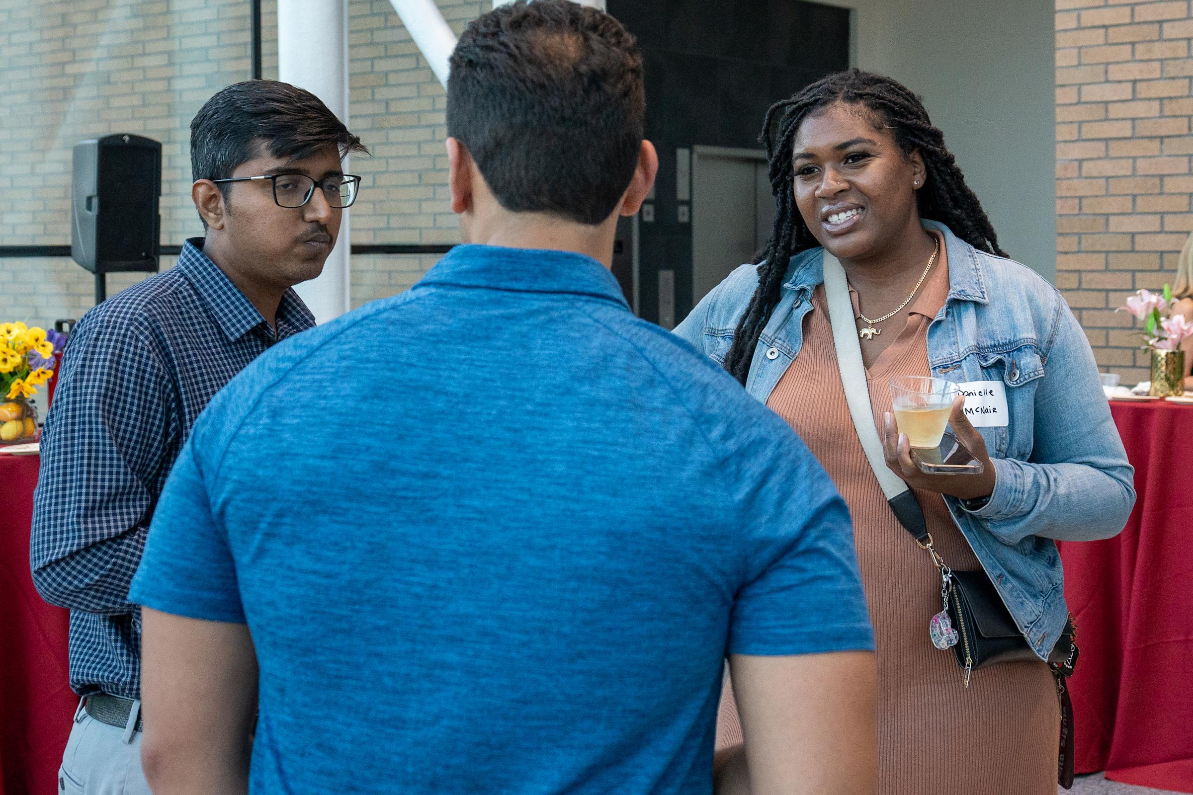 MBA student Danielle speaking with classmates