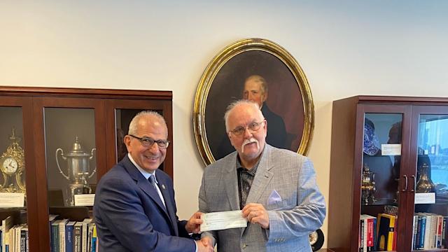 President Nariman Farvardin with Steve Standler, executor of the estate of Reno Del Ben ’58.