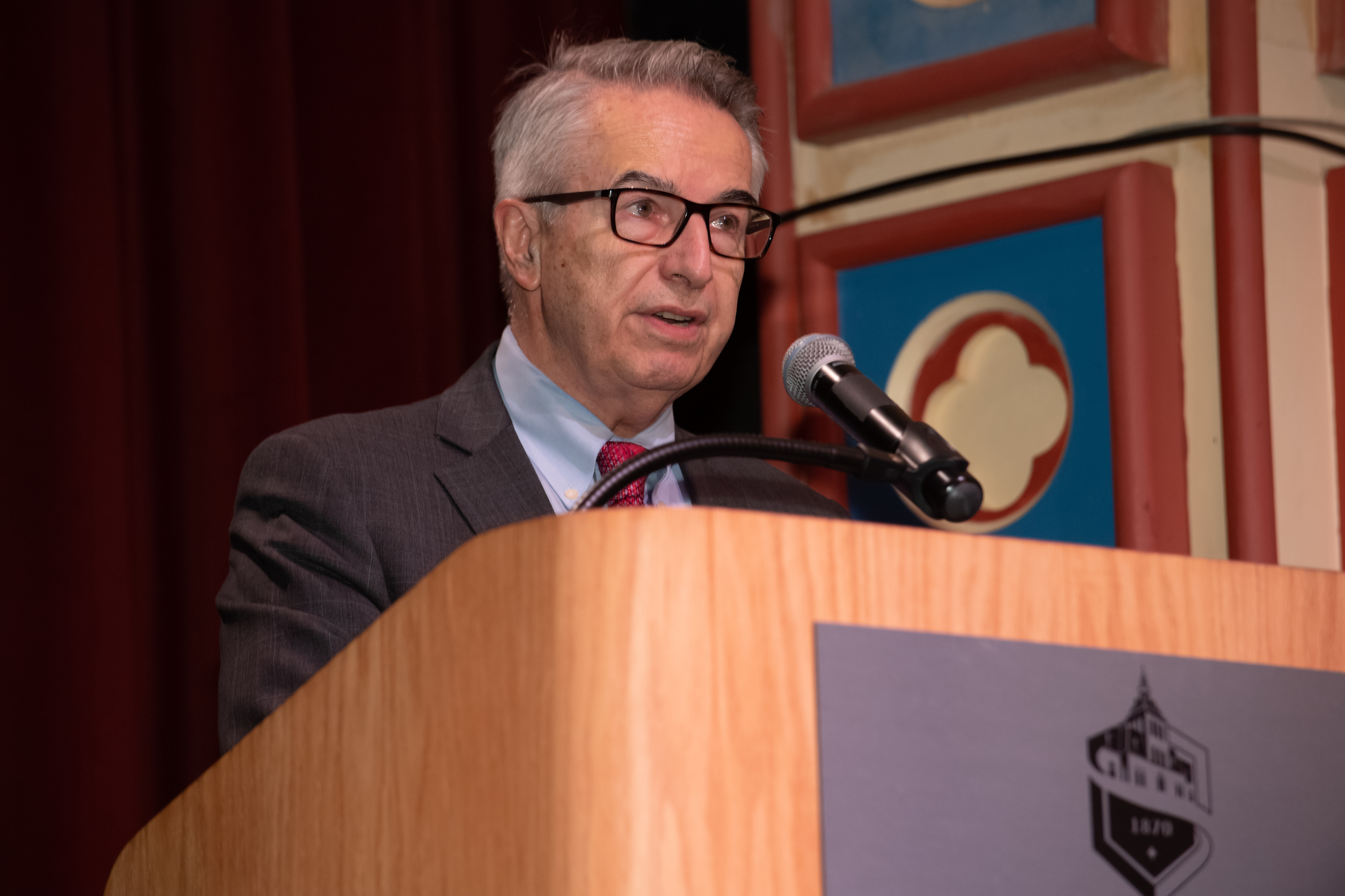 Speaker at the podium giving a speech at Stevens Graduation Awards 2023