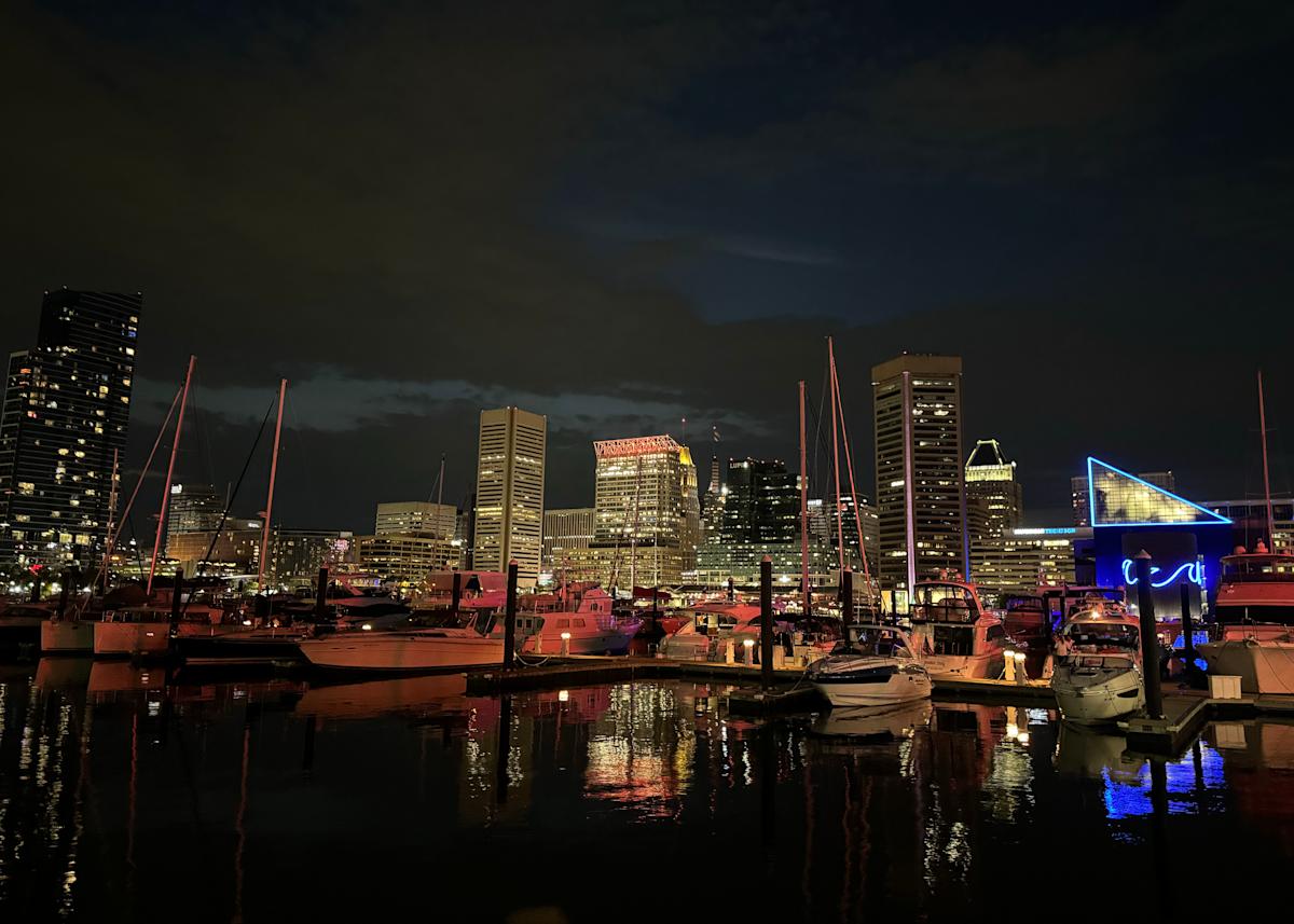 A view of Baltimore's inner harbor at night.