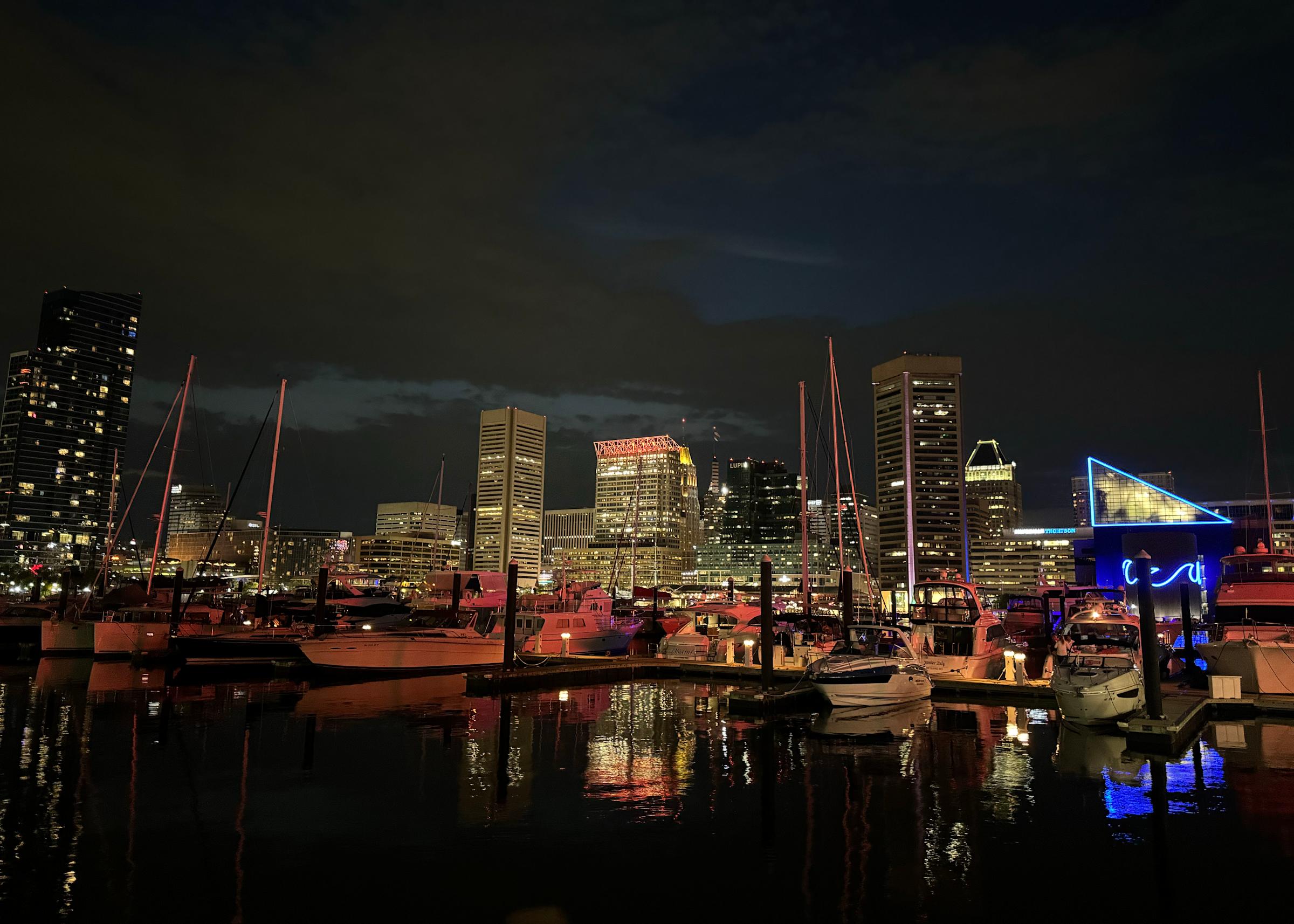A view of Baltimore's inner harbor at night.