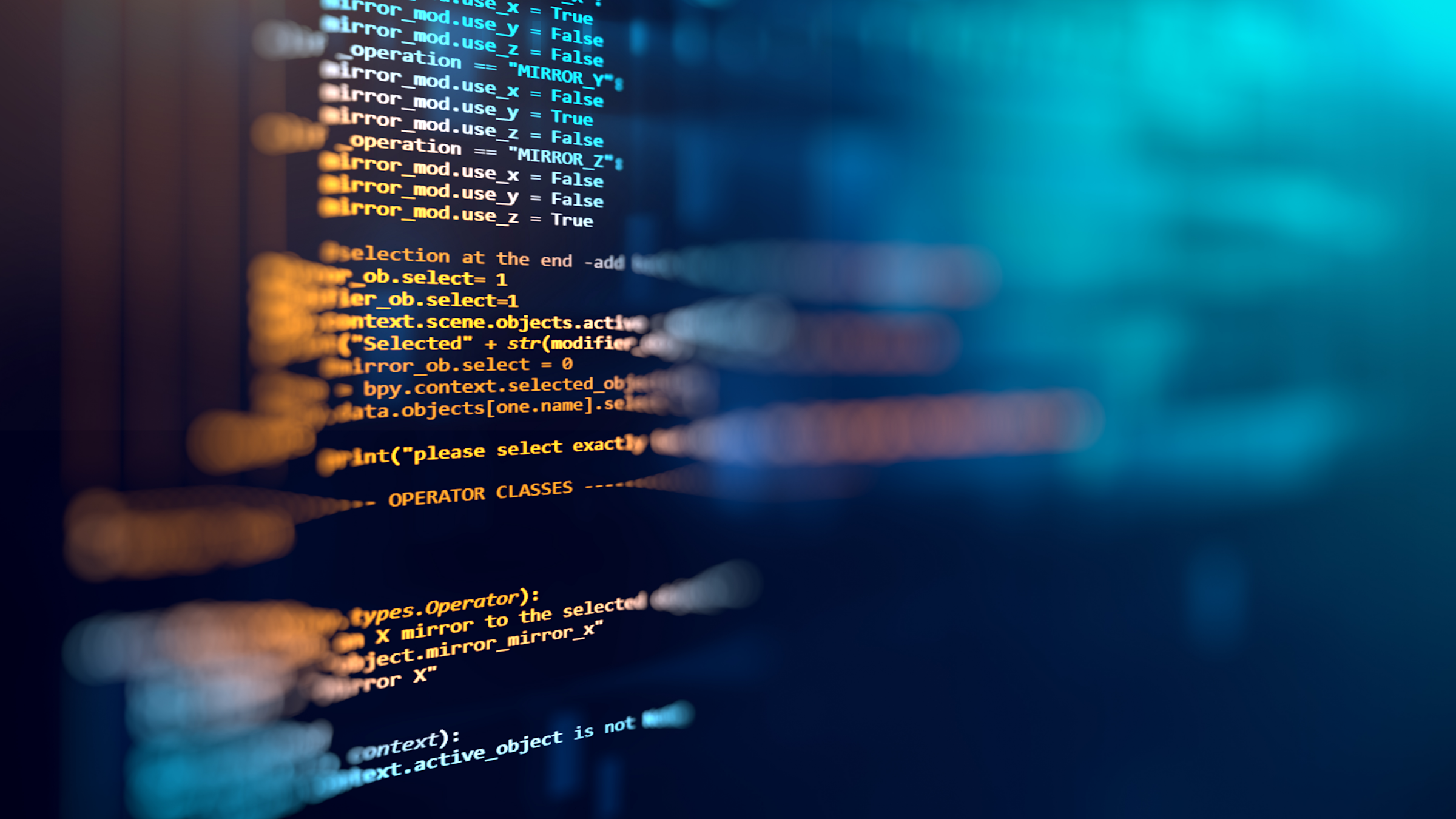 A peephole view of multicolor coding on a computer screen with a blurred foreground.