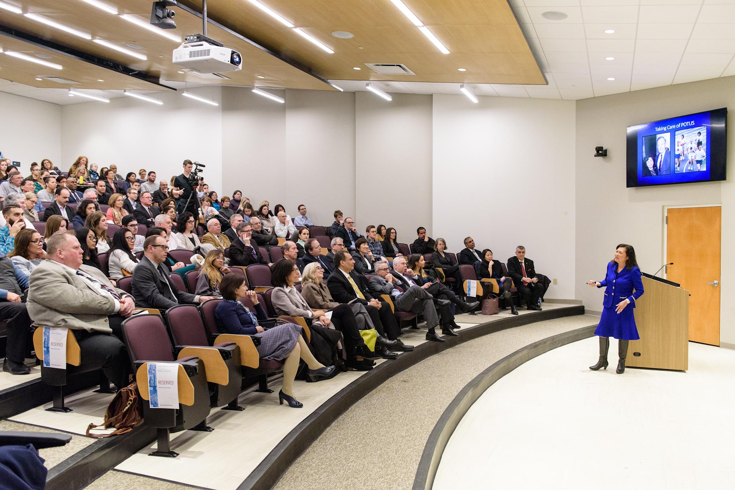 People listen to lecture