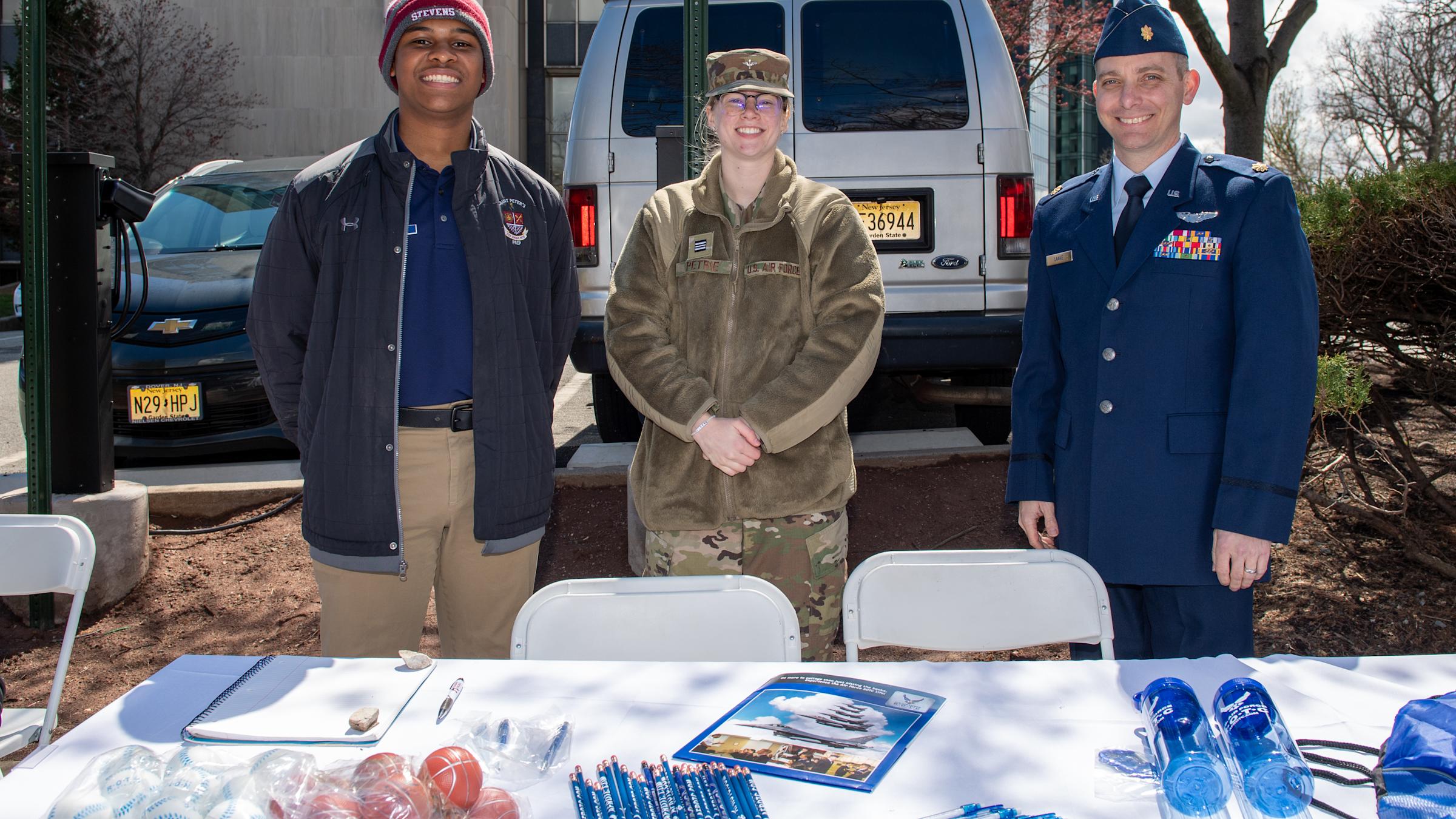 Students in Uniform at information table