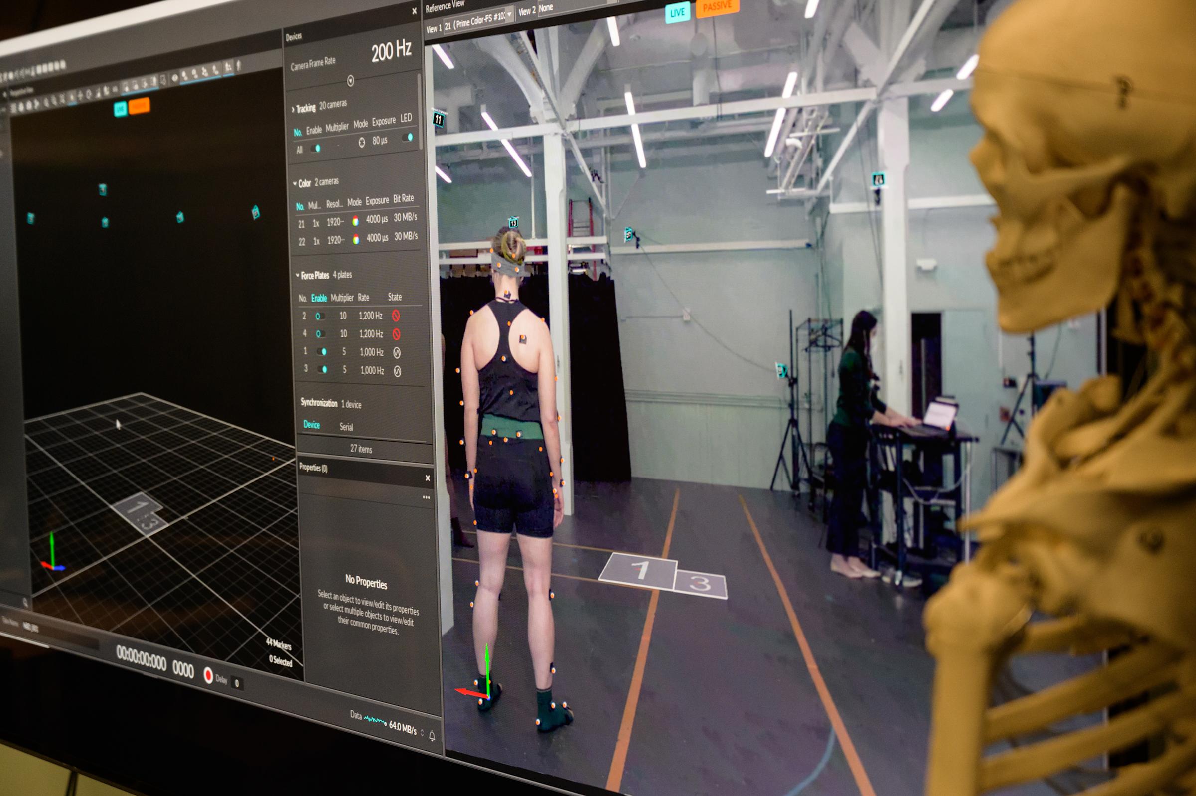 A computer monitor showing motion capture software work with a live camera.