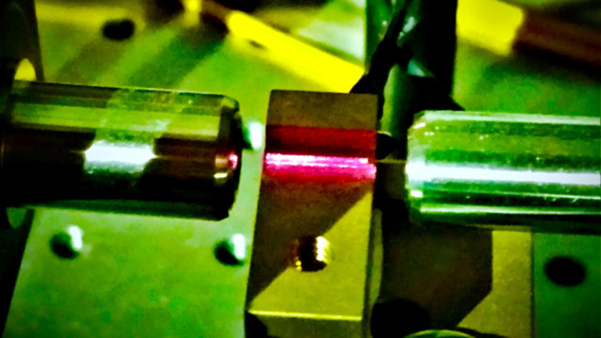 A stock image of two lasers intersecting