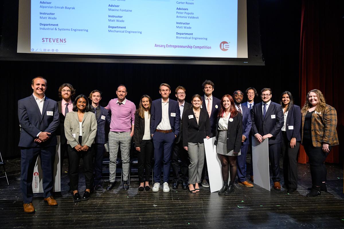 Students pose on stage at the Ansary Entrepreneurship Competition