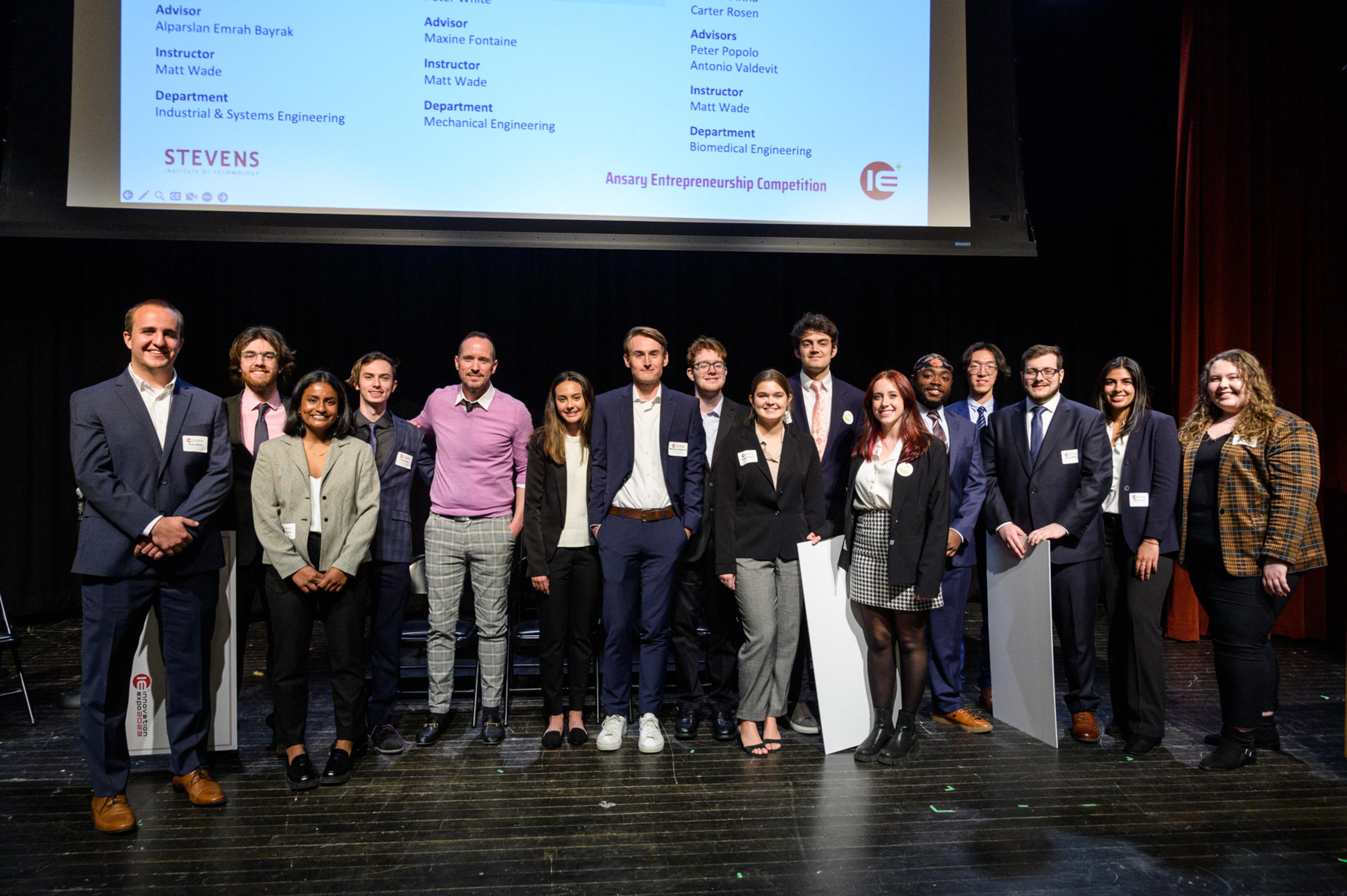 Students pose on stage at the Ansary Entrepreneurship Competition