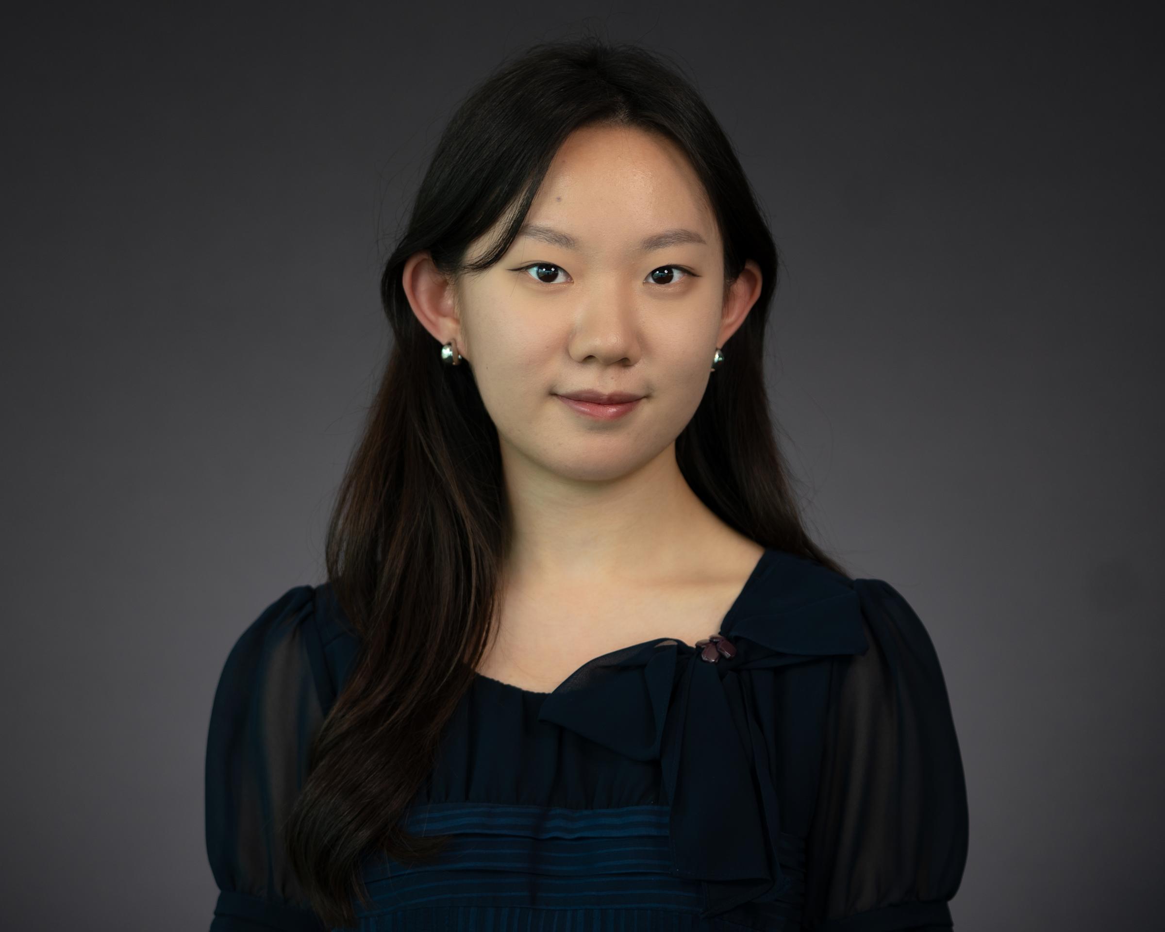 Headshot of Amanda Han wearing professional attire.