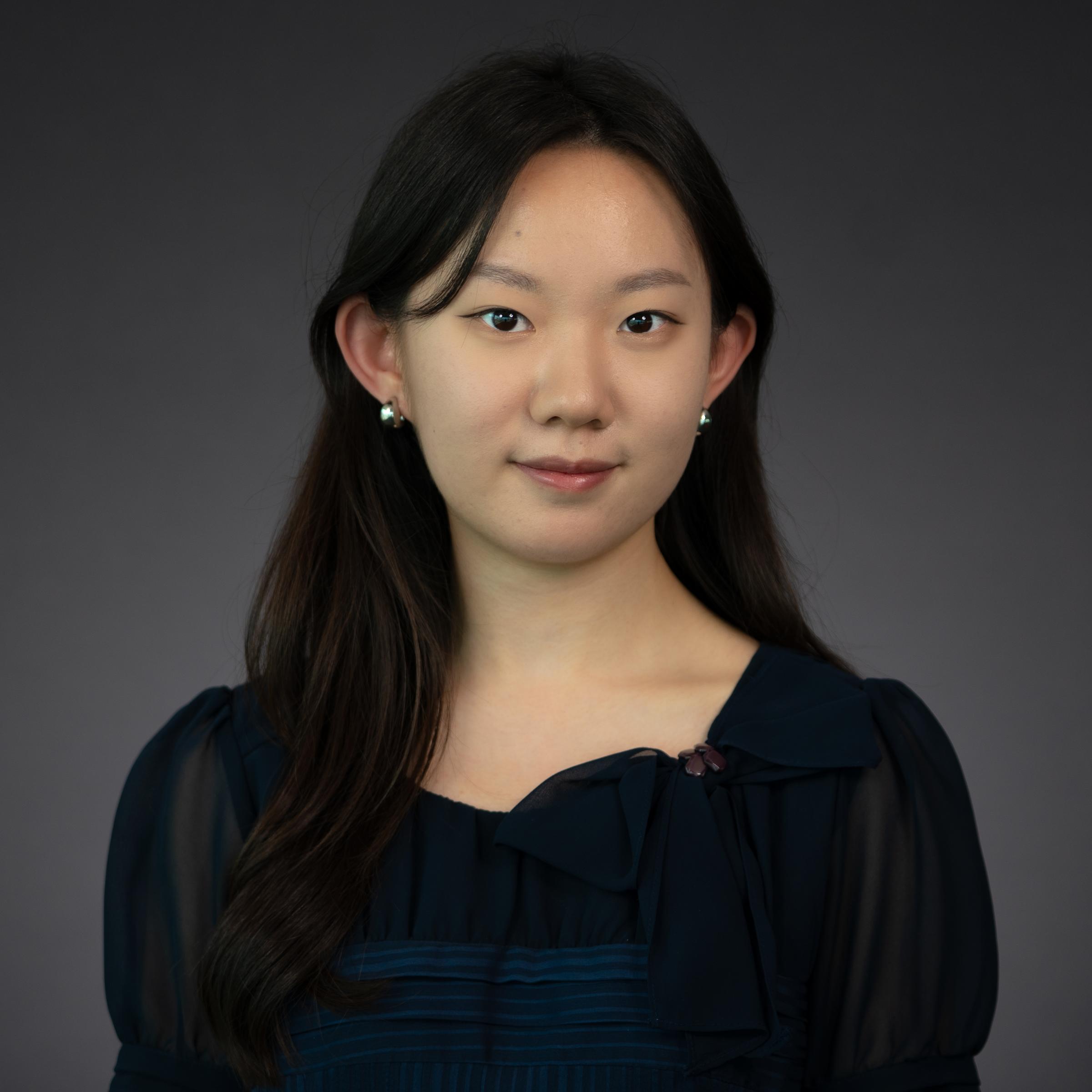 Headshot of Amanda Han wearing professional attire.