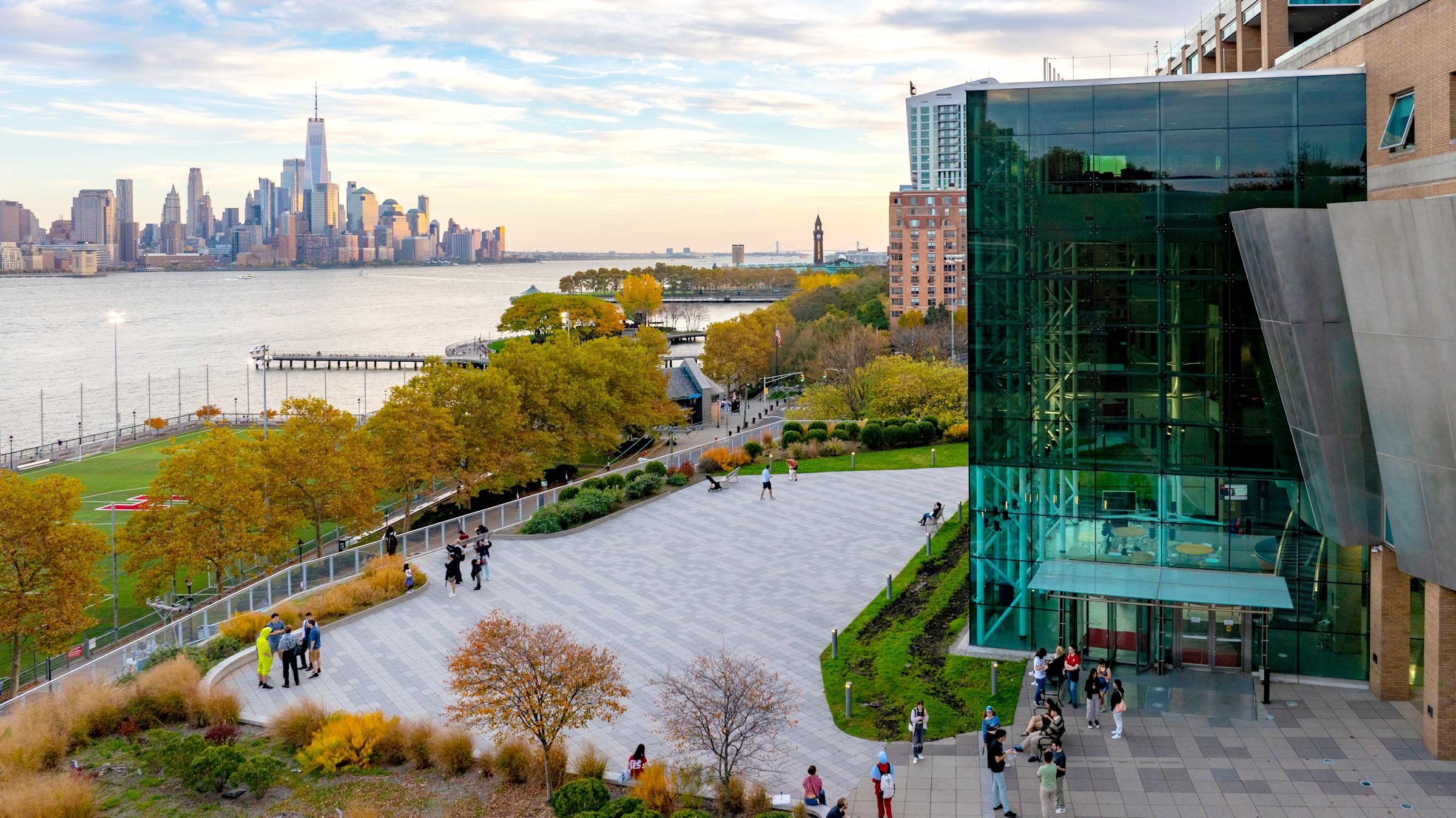 Overhead view of the patio behind Babbio with the Manhattan skyline across the Hudson River.