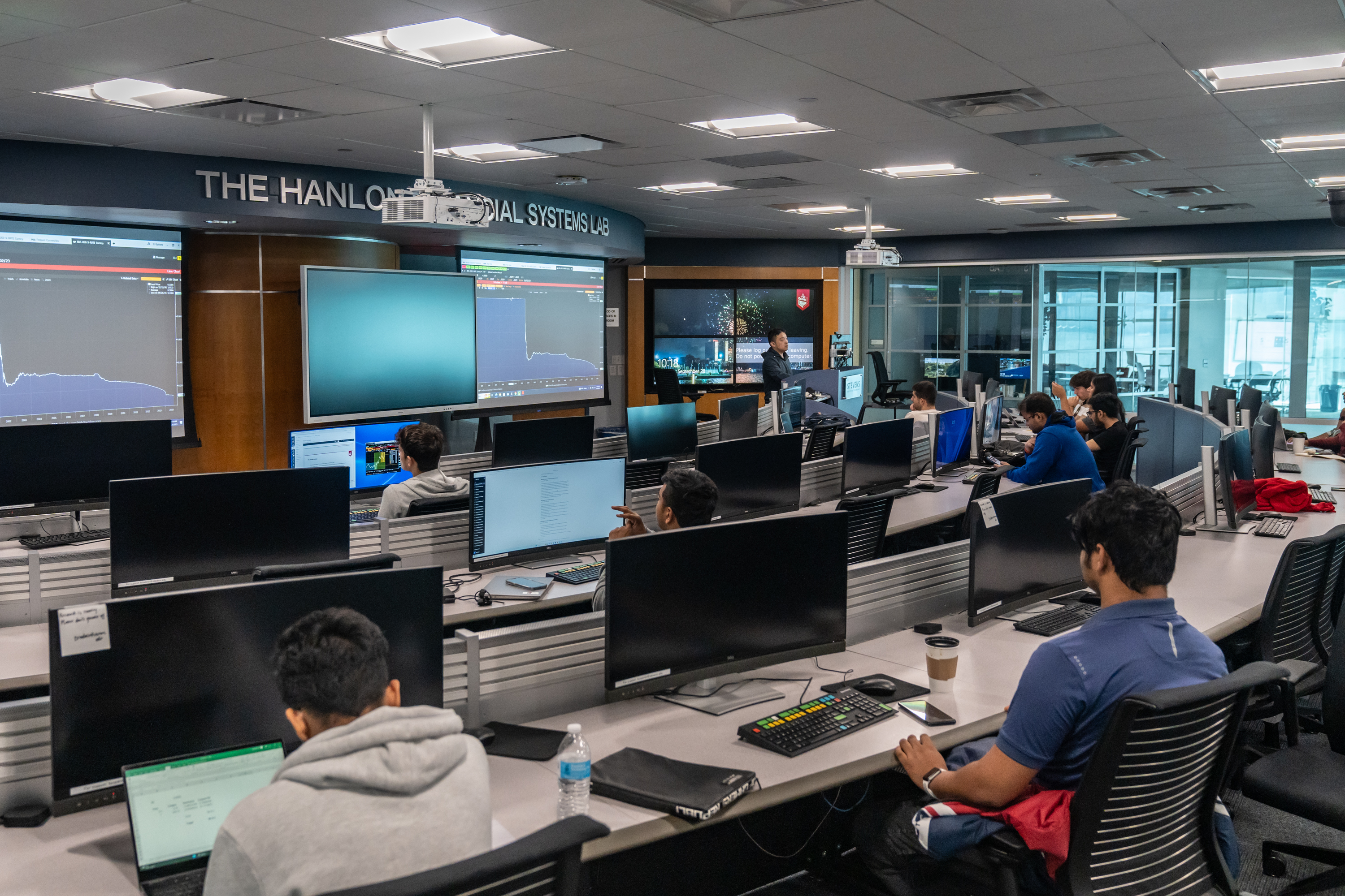 The Hanlon Financial Systems Lab with computer monitors and screens.