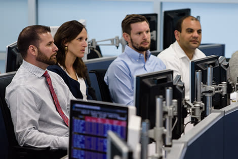 Four recruiting managers watching a presentation