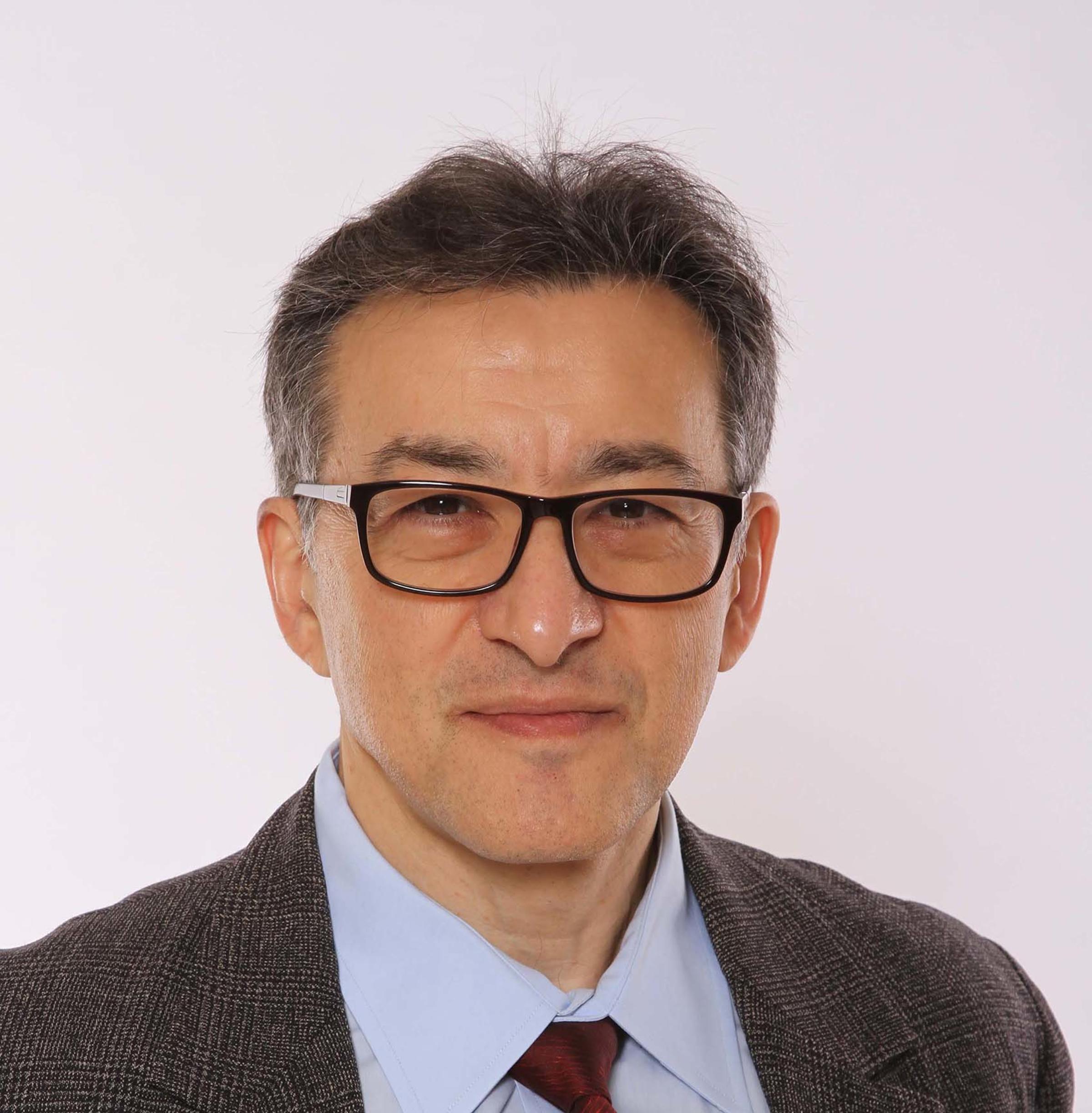 Headshot of Mikhail Oet