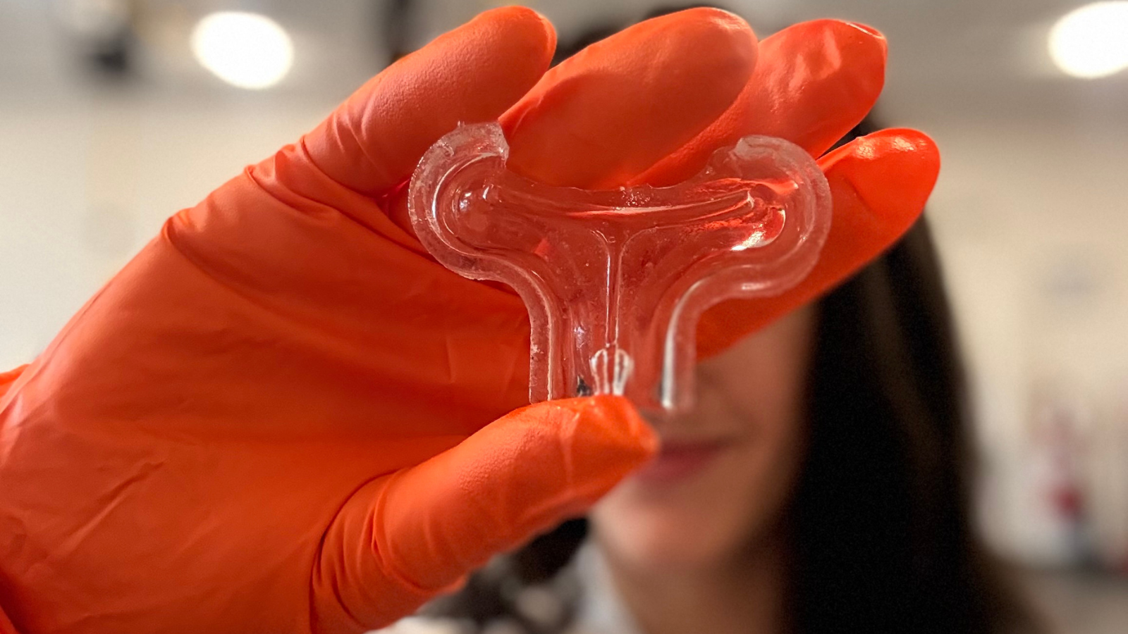 5 Biomedical Engineering students, Ujjwal Rameshwaram, Sophia Donskoy, Kaitlyn Tsai, Ruhi Ajinkya and Sanaiya Villanueva stand around their presentation poster, titled SensiTear: A Platform Revolutionizing Disease Diagnostics.