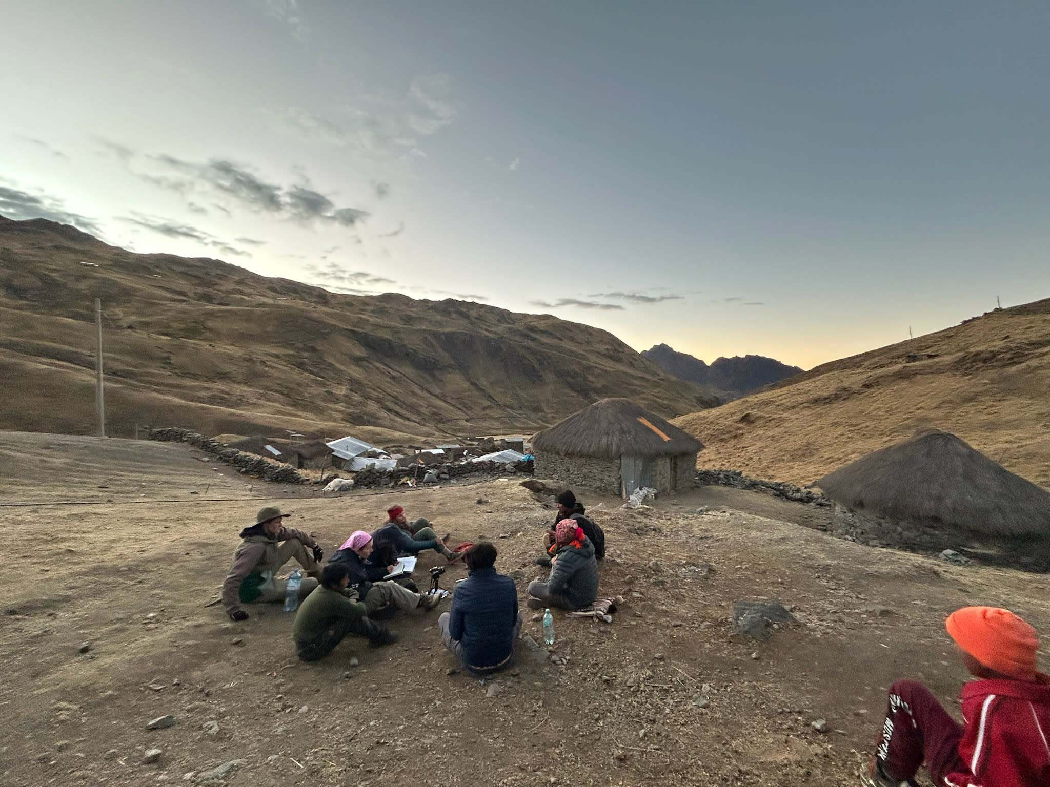 Students gathering together on the mountainside.