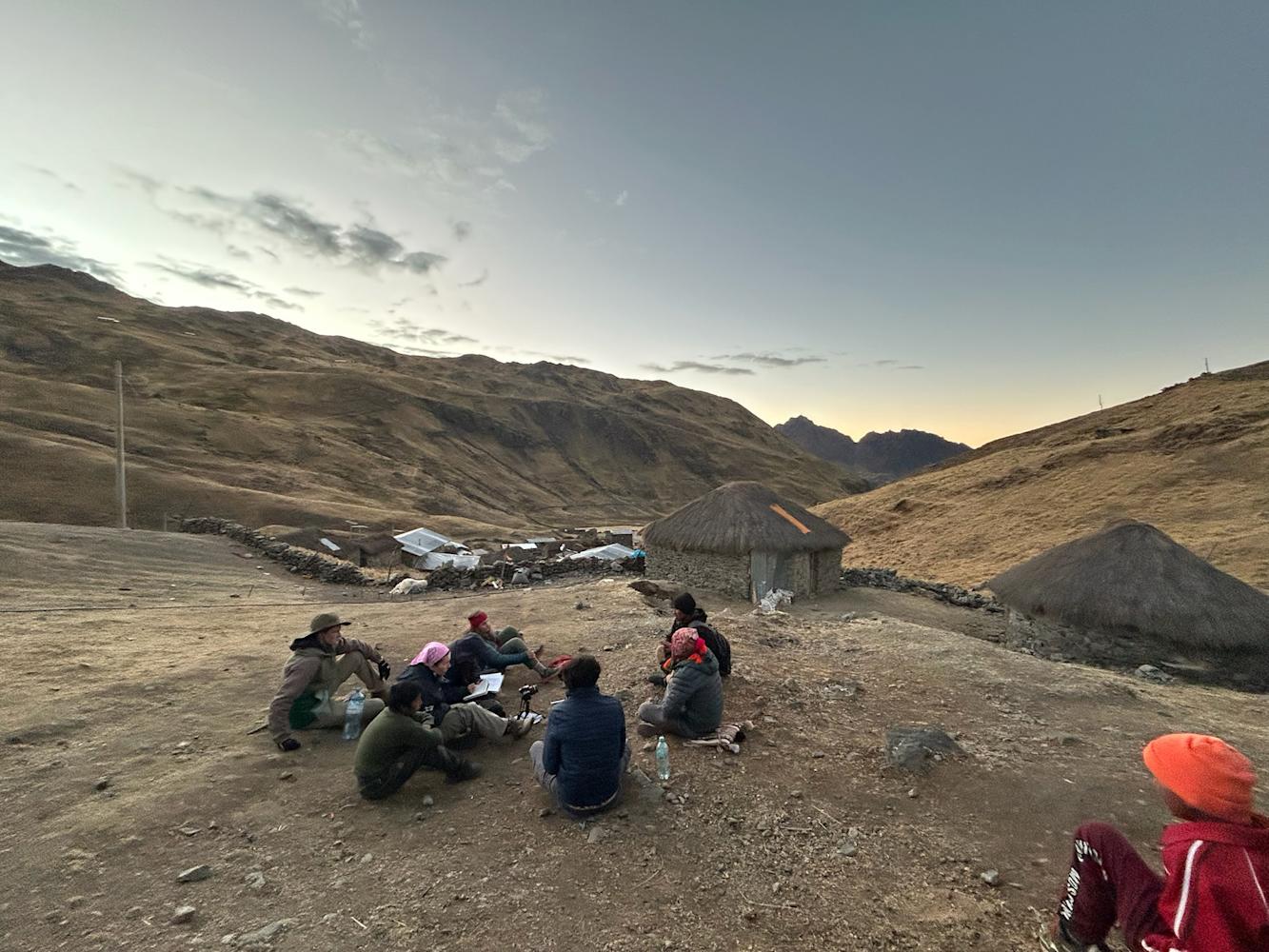 Students gathering together on the mountainside.