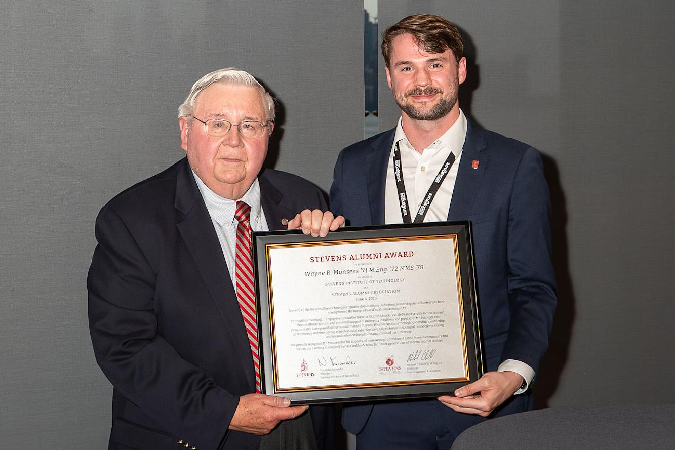 Stevens Alumni Award recipient Wayne R. Monsees ’71 M.Eng. ’72 MMS ’78 poses with SAA President Michael Cahill ’15 M.Eng. ’15